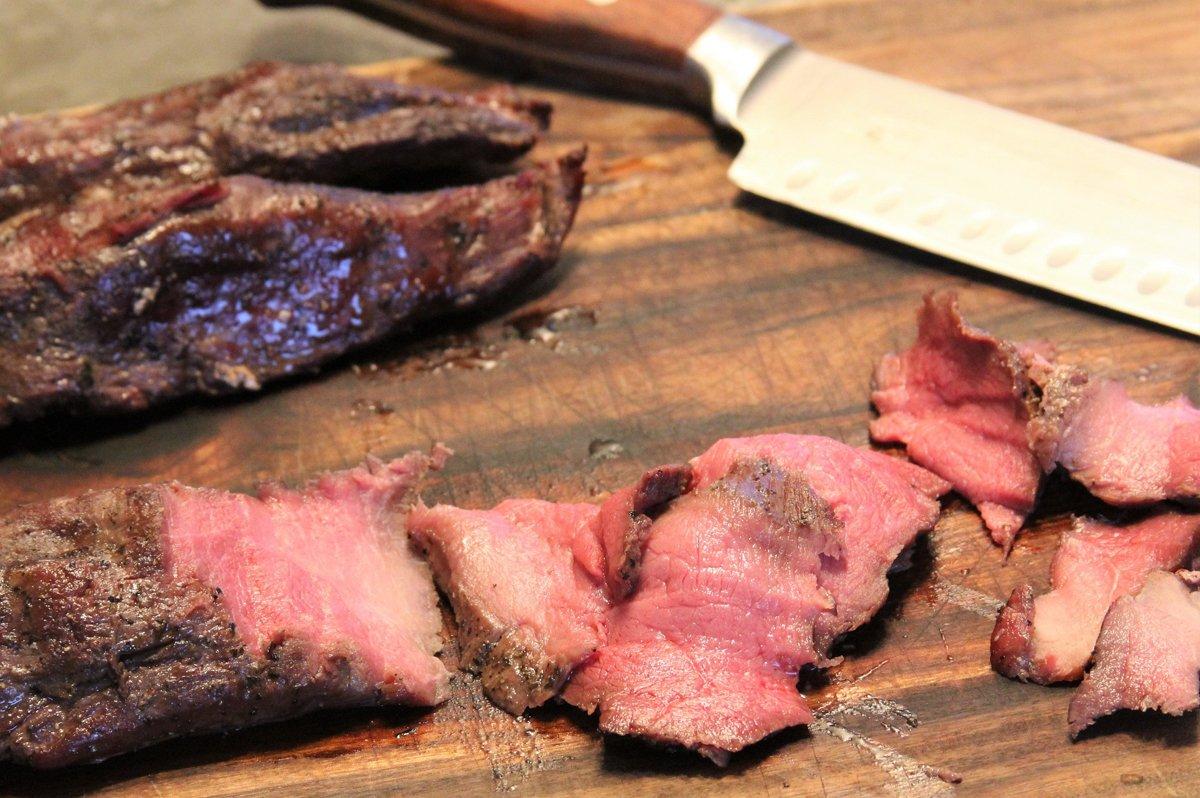 Slice the grilled tenderloin against the grain for maximum tenderness.