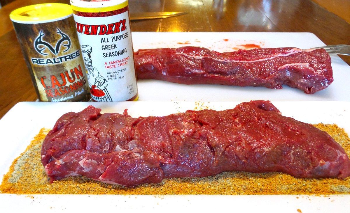 Trim away any fat and silverskin before seasoning the backstrap.
