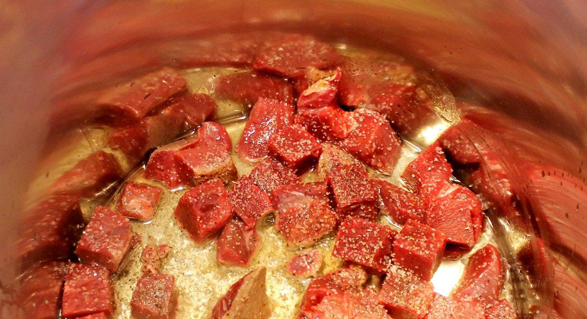 Brown the venison in hot oil to add an extra layer of flavor to the finished soup.