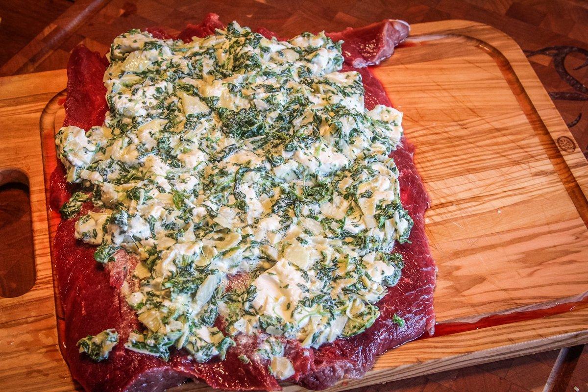 Spread the dip over the butterflied backstrap before rolling.