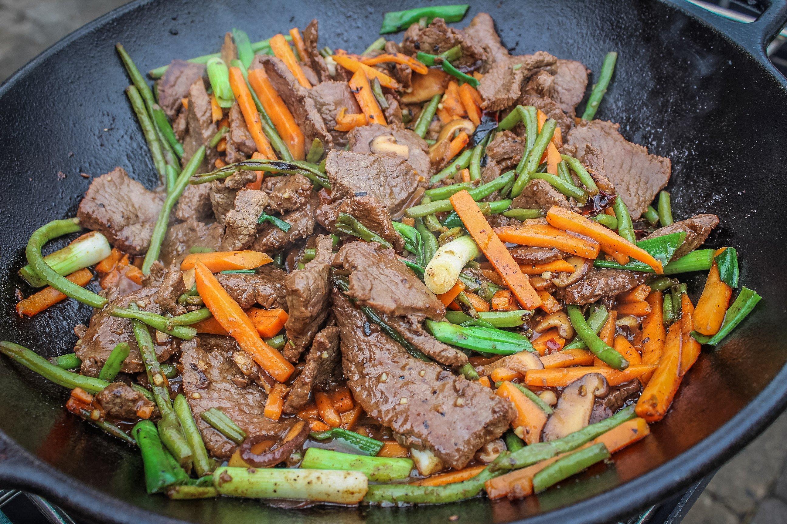 Stir frying outside on a gas burner cuts down on smoke in the kitchen.