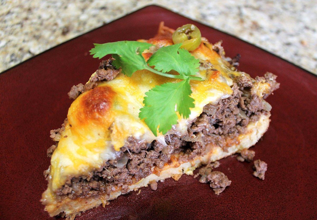 With a corn filled masa crust, spicy meat mixture and melted cheese, this tamale pie will be a hit with the entire family.