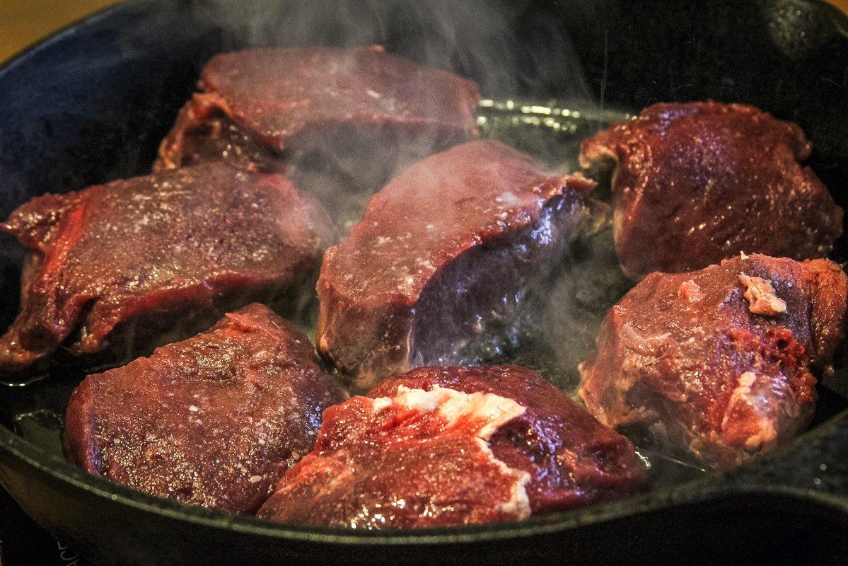 While the potatoes roast, pan sear the backstrap medallions in remaining duck fat.