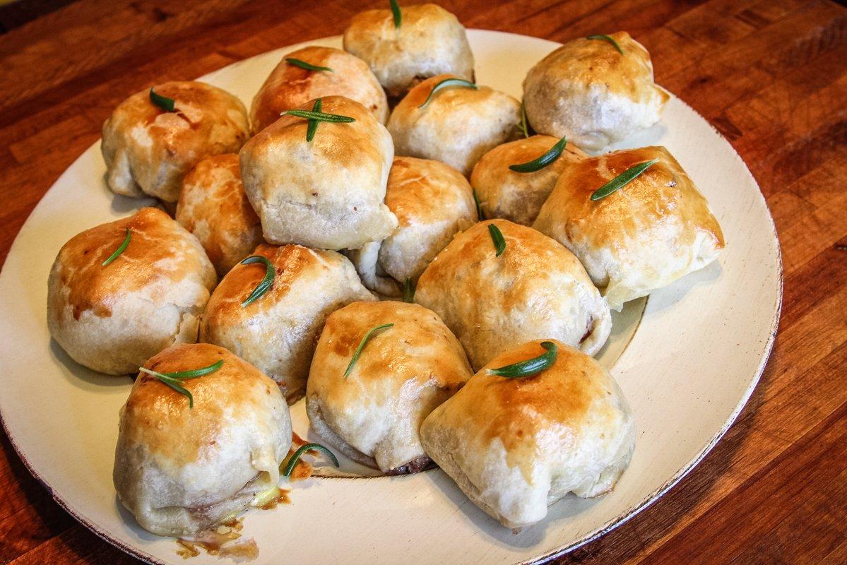 Top each wellington with a sprig of fresh rosemary for garnish.