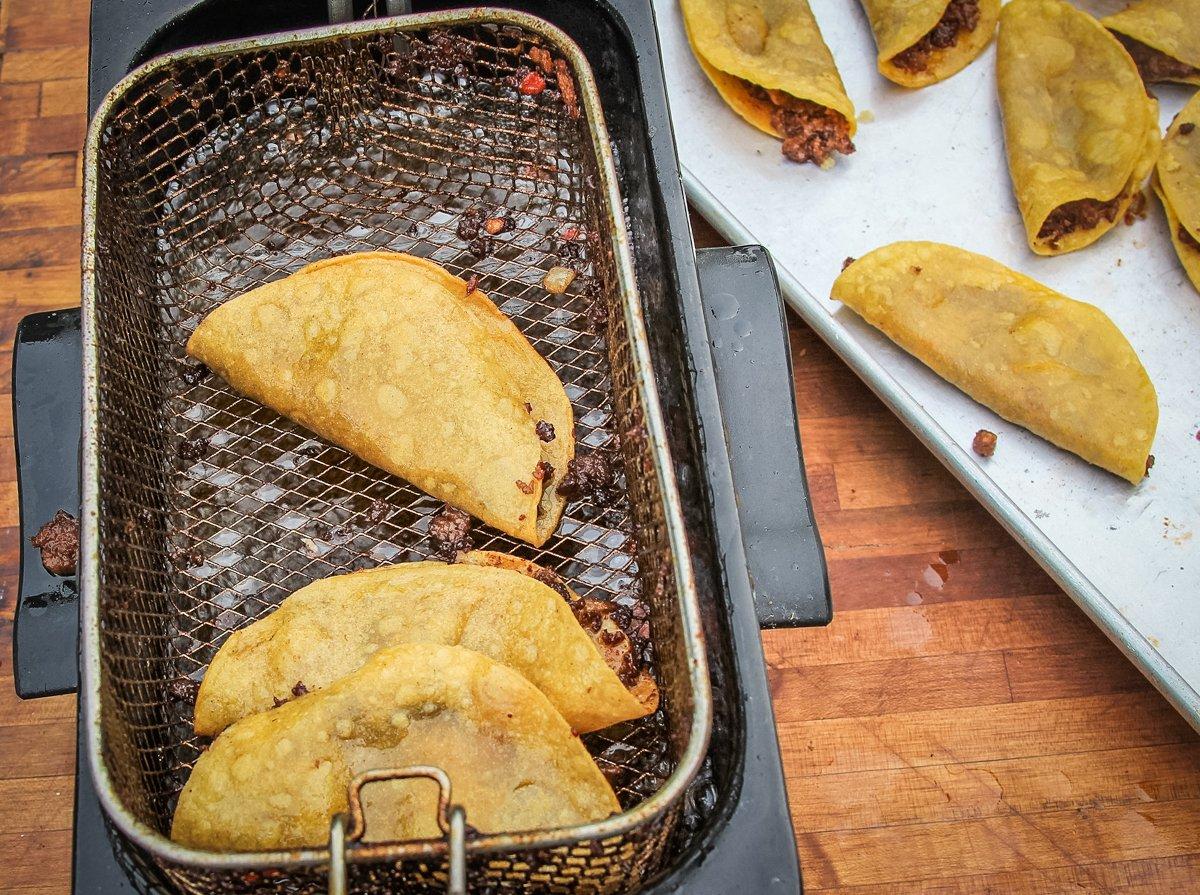 Deep fry the tacos 3-5 minutes until crisp.