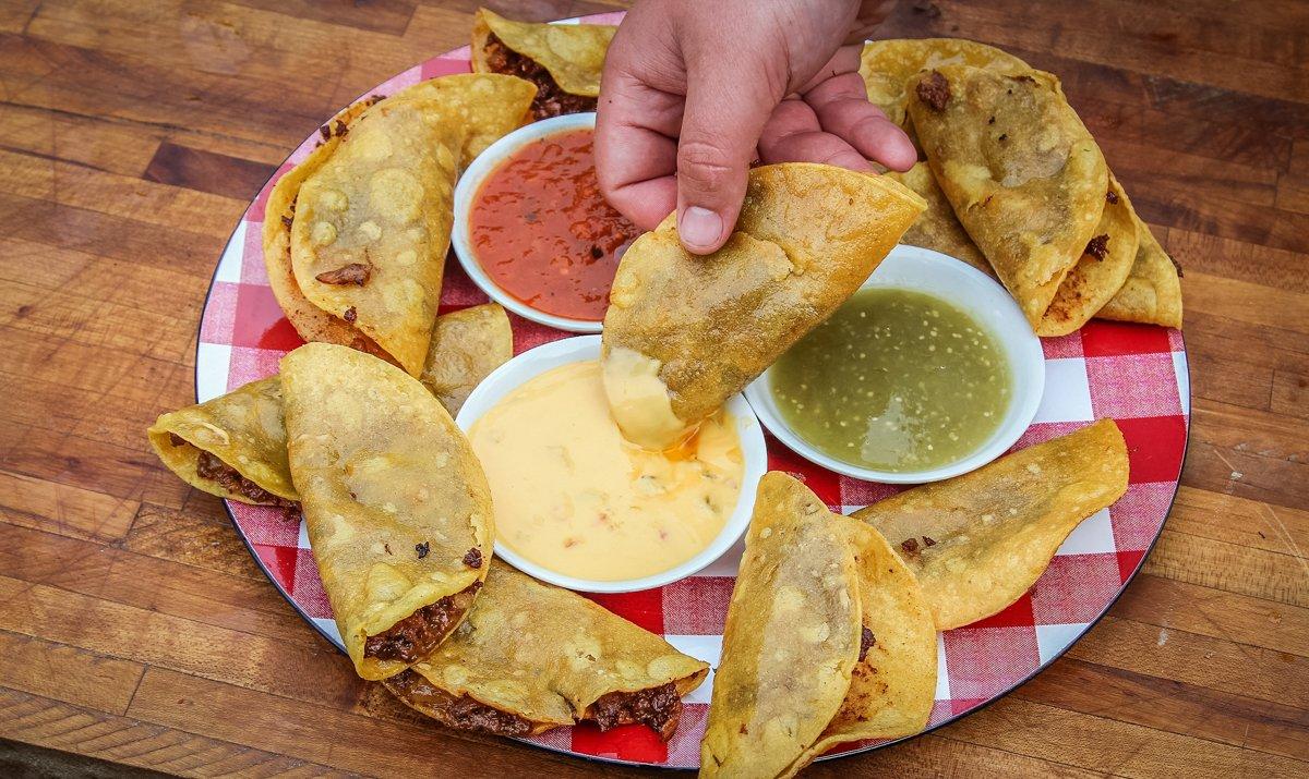 Serve the crispy fried tacos with your favorite dipping sauces.