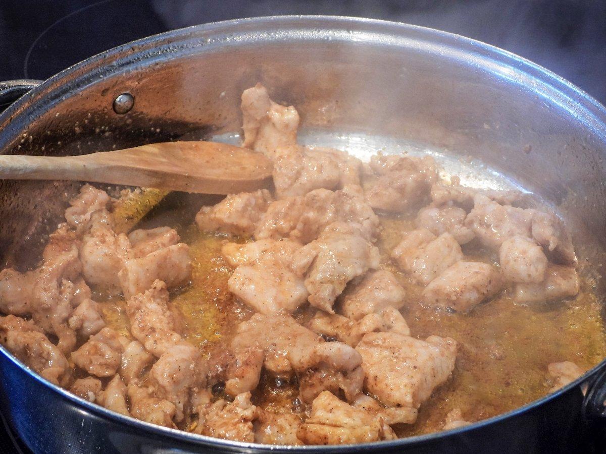 Sauté the gator meat over medium-high heat until just cooked through.