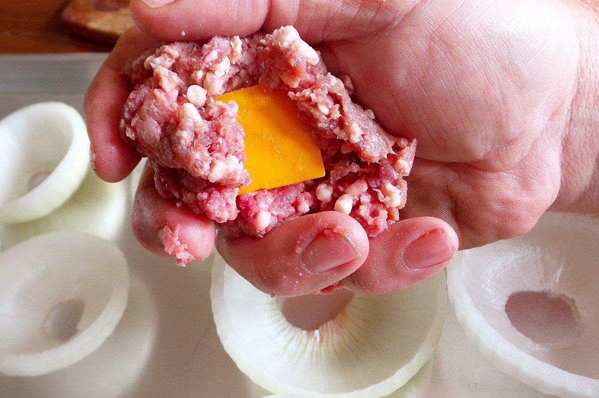 Wrap a chunk of cheese in venison burger.