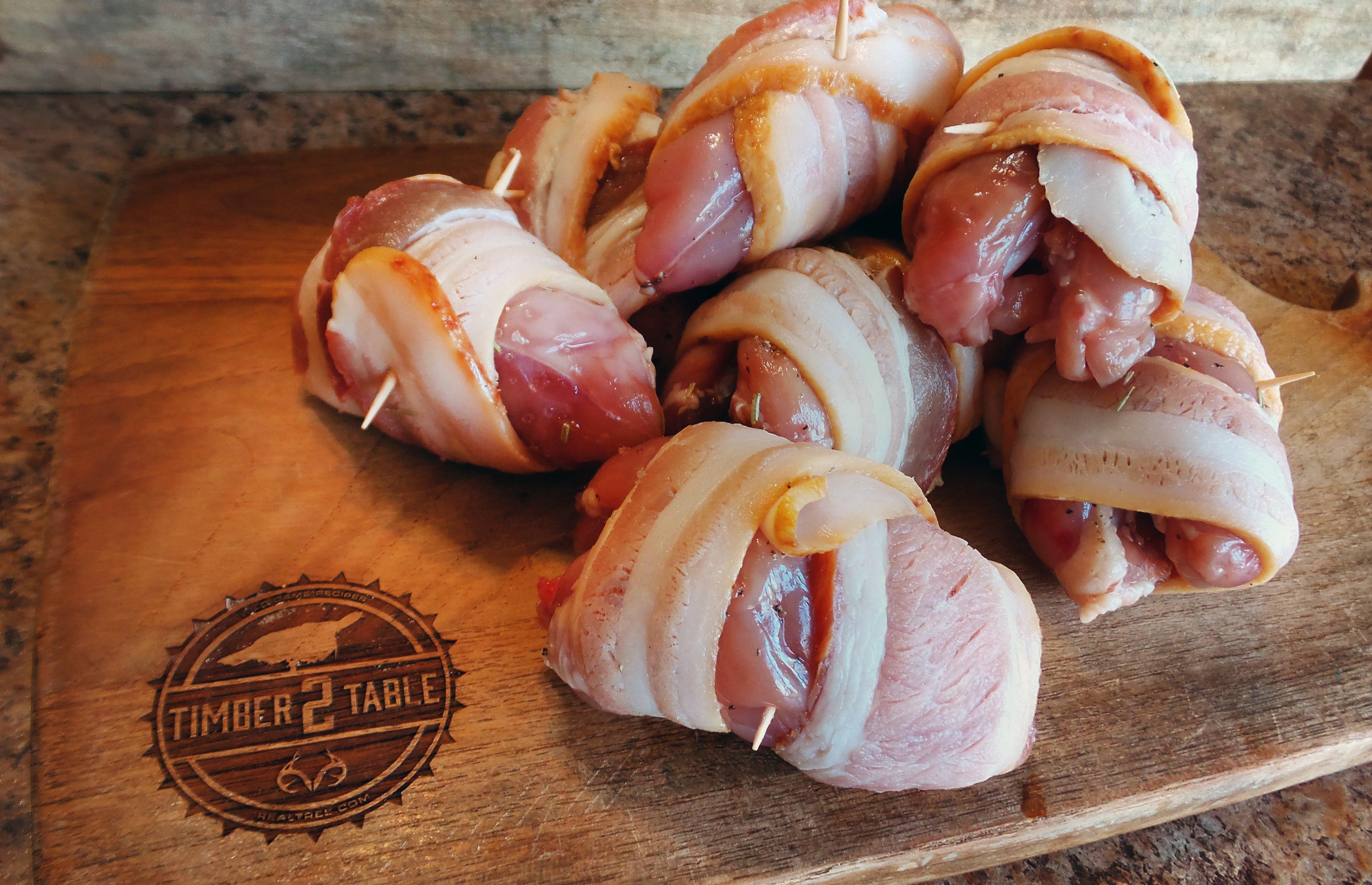Season each quail breast, wrap in bacon, and secure with a toothpick.