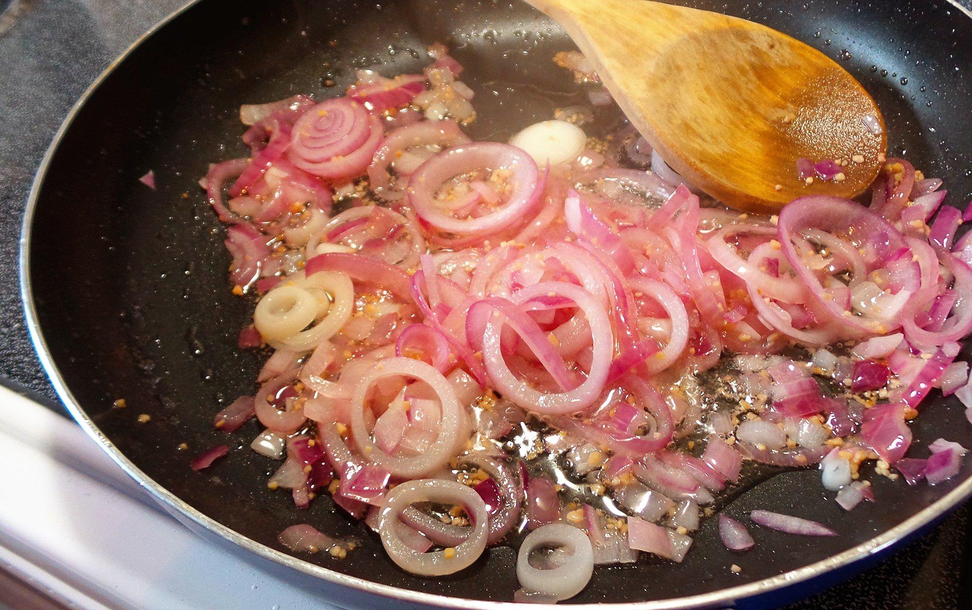Saute the onions till soft, then add the garlic and chopped peppers.