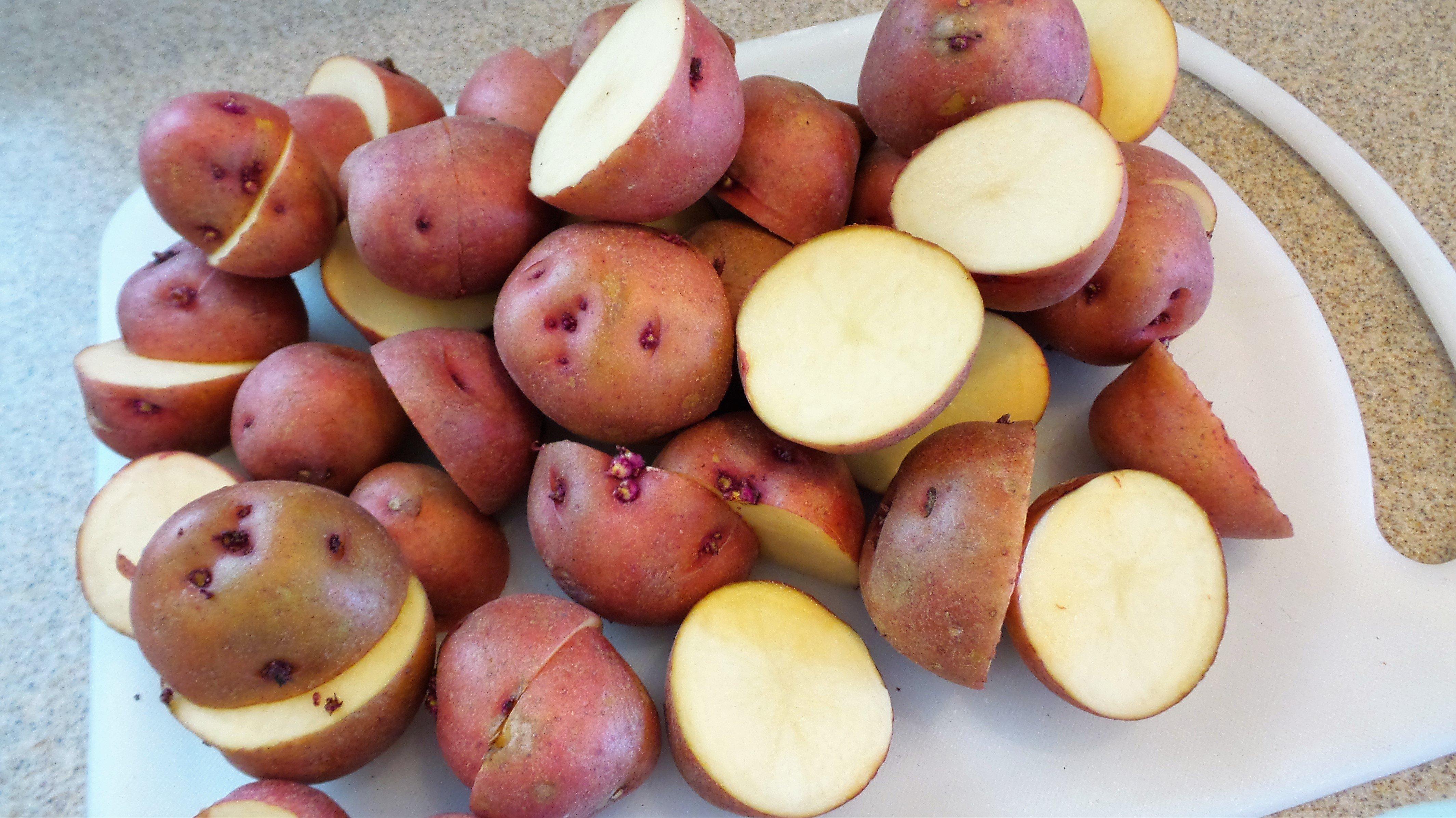 If the potatoes are larger than a golf ball, halve or quarter before boiling.