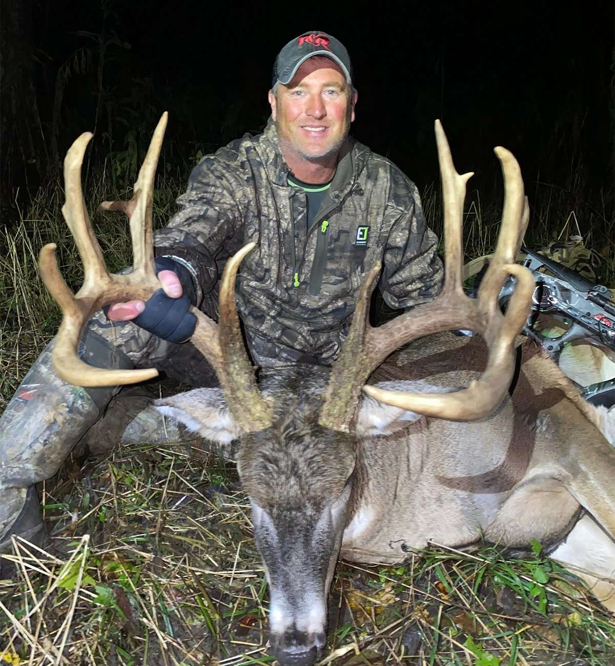 Chris Ward is all smiles with his 180-inch Kansas buck. Image by Red Rising TV