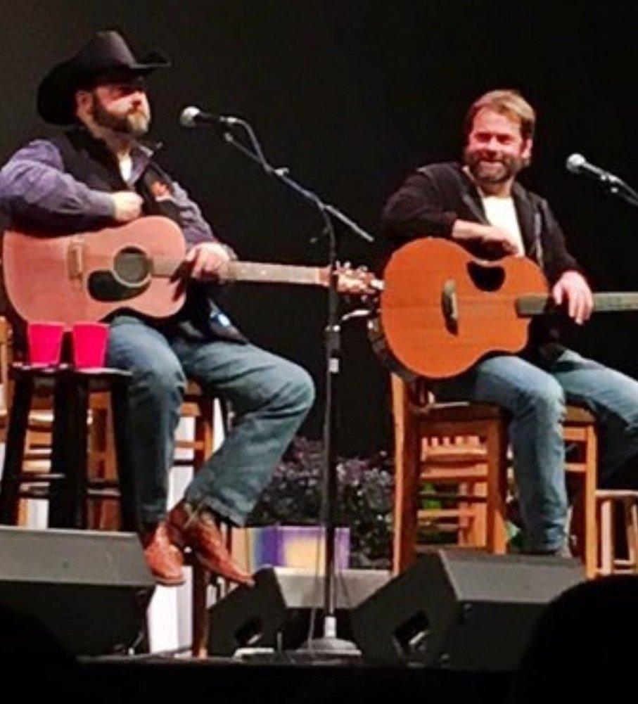 Daryle Singletary and Andy Griggs perform together on stage. -- Photo provided by Andy Griggs