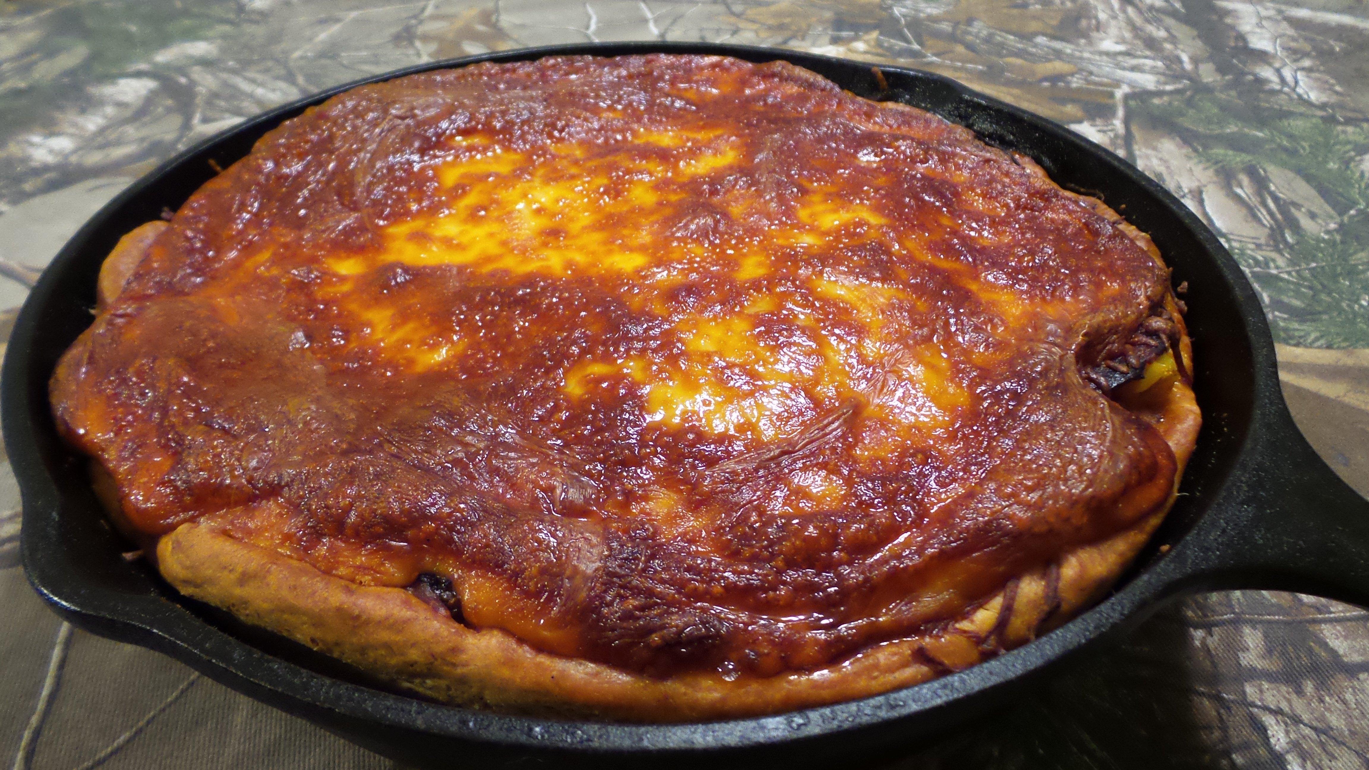 Deep dish pizza with a thick meaty sauce of ground venison will be a family favorite.