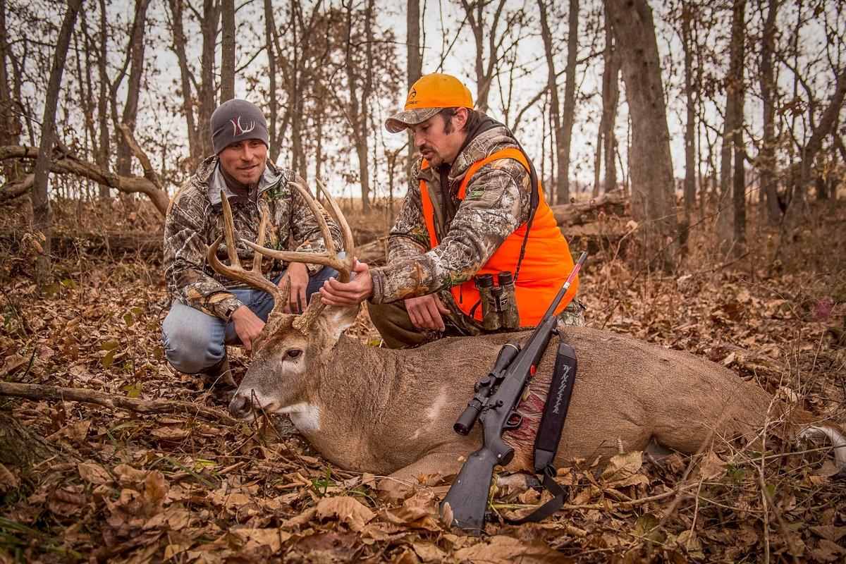 The author and friend Joe Ogden admire a massive-bodied Missouri brute. (John DePalma photo)