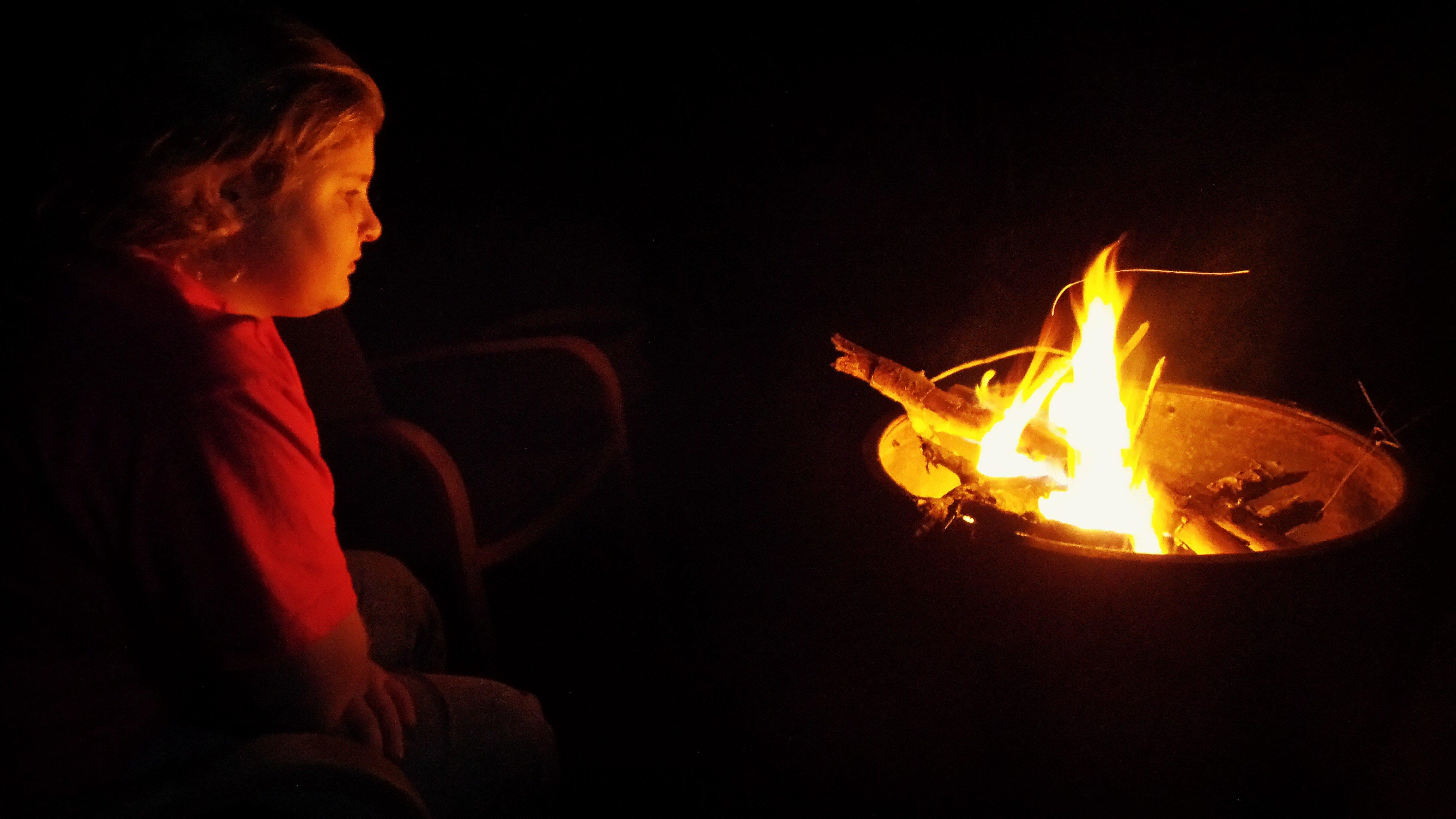 Quiet time around the fire is the best part of camp.