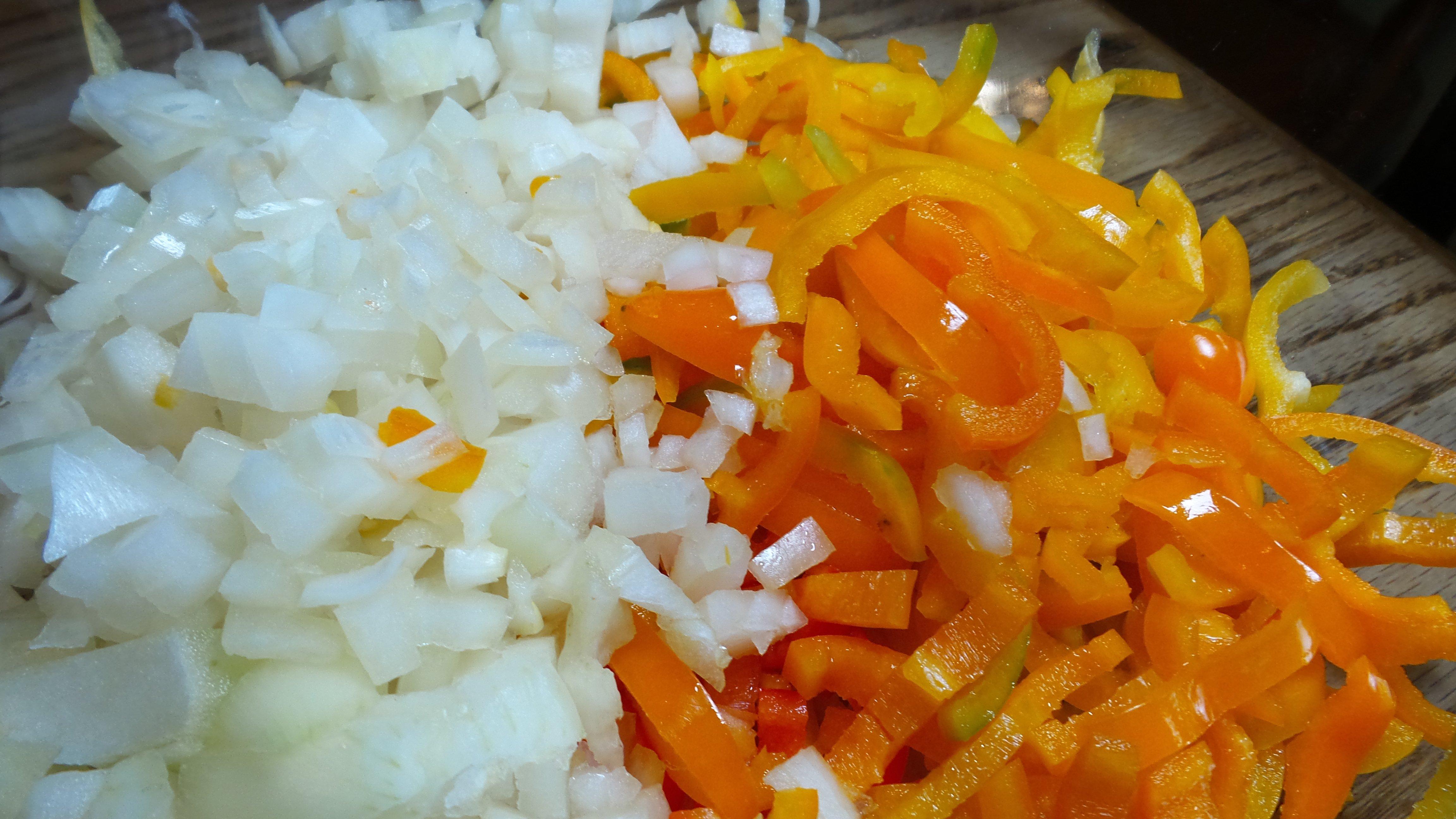 Dice the peppers and onions into a fine chop.