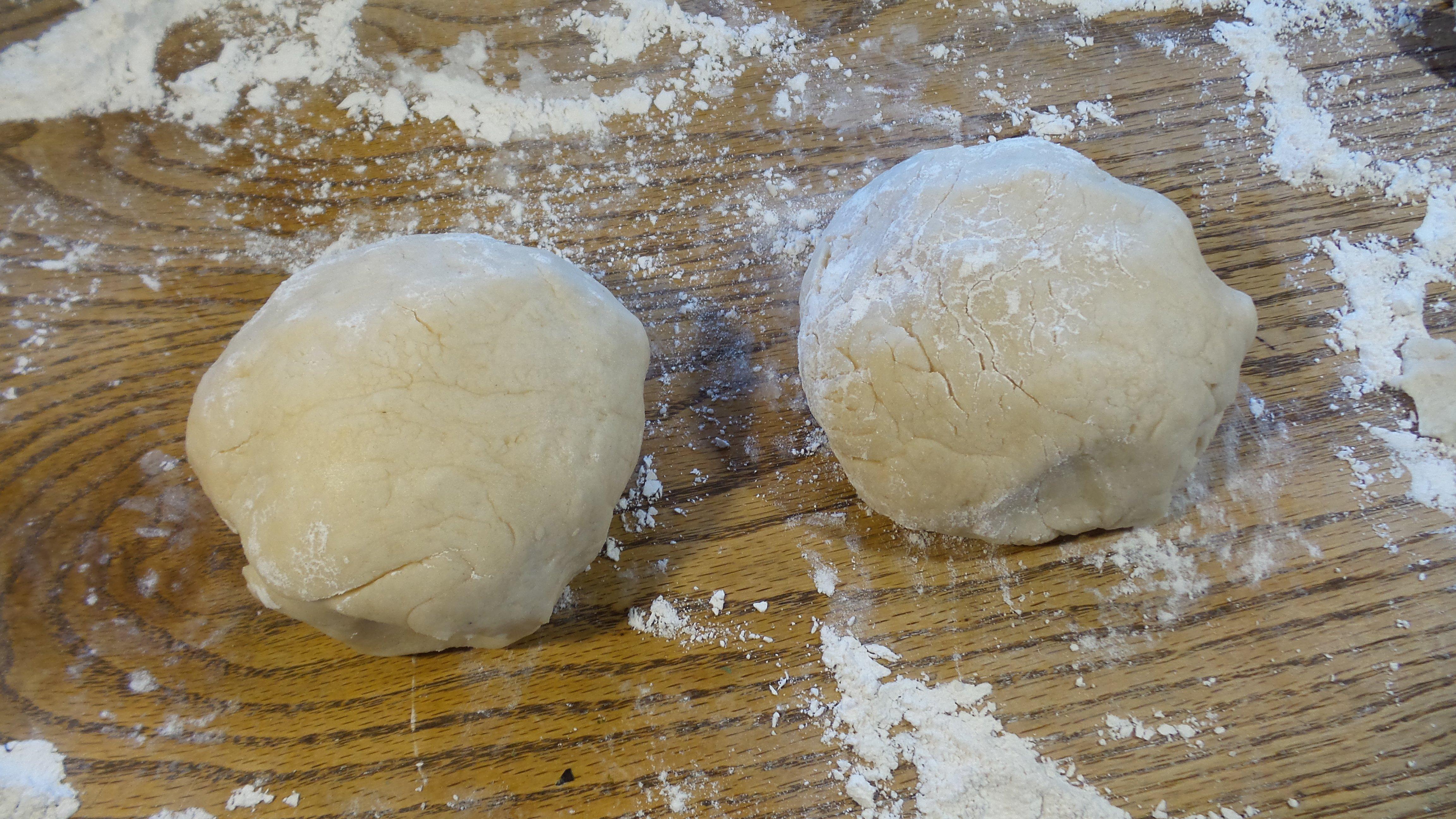 Divide the dough into two equal balls and set aside to rest.