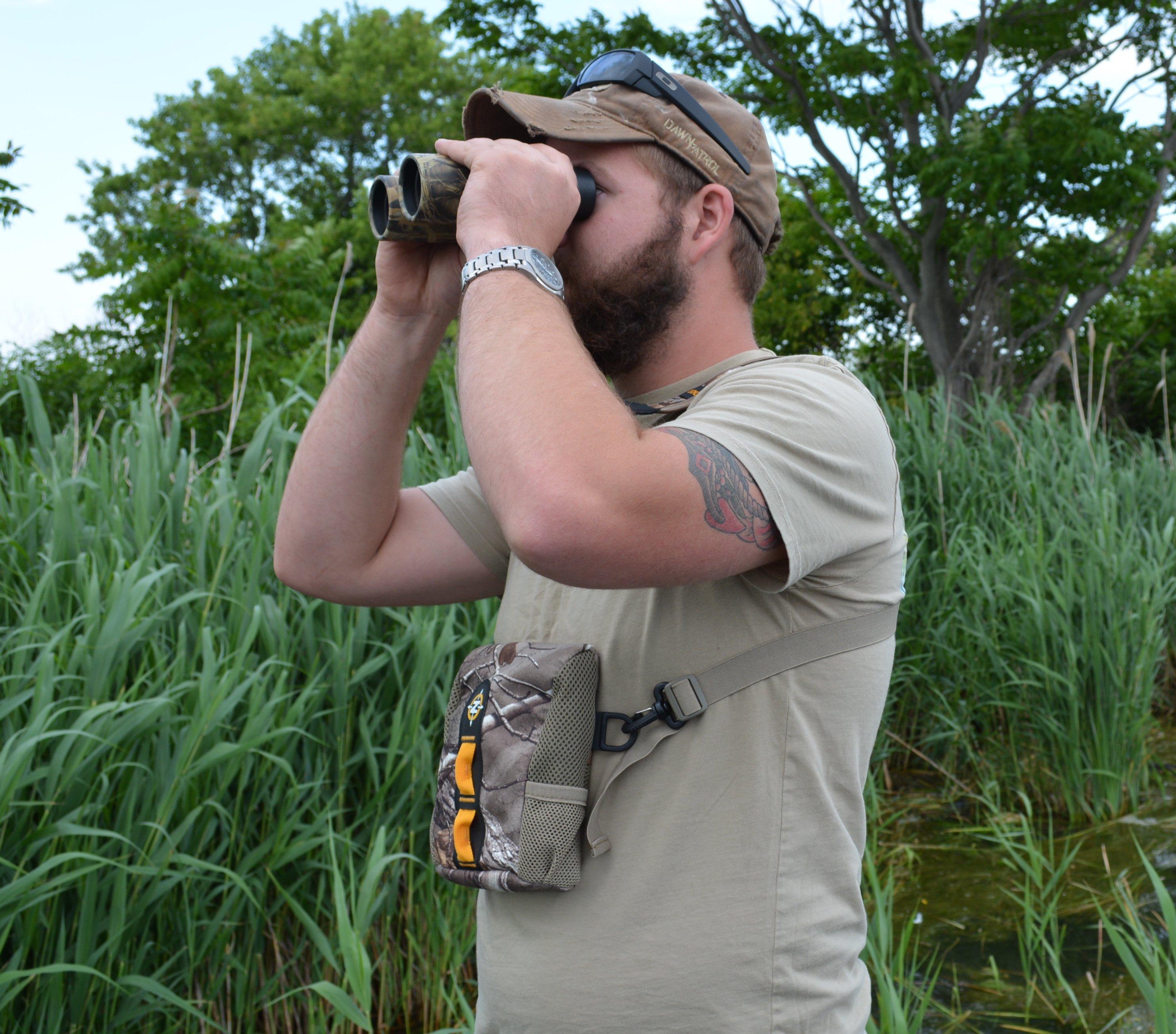hunters uses binoculars