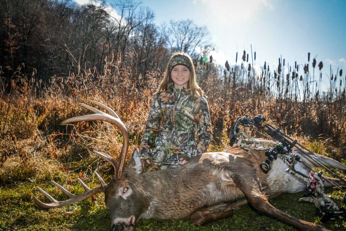 Aleah Wozniak poses with her big mountain buck. (David Wozniak photo)