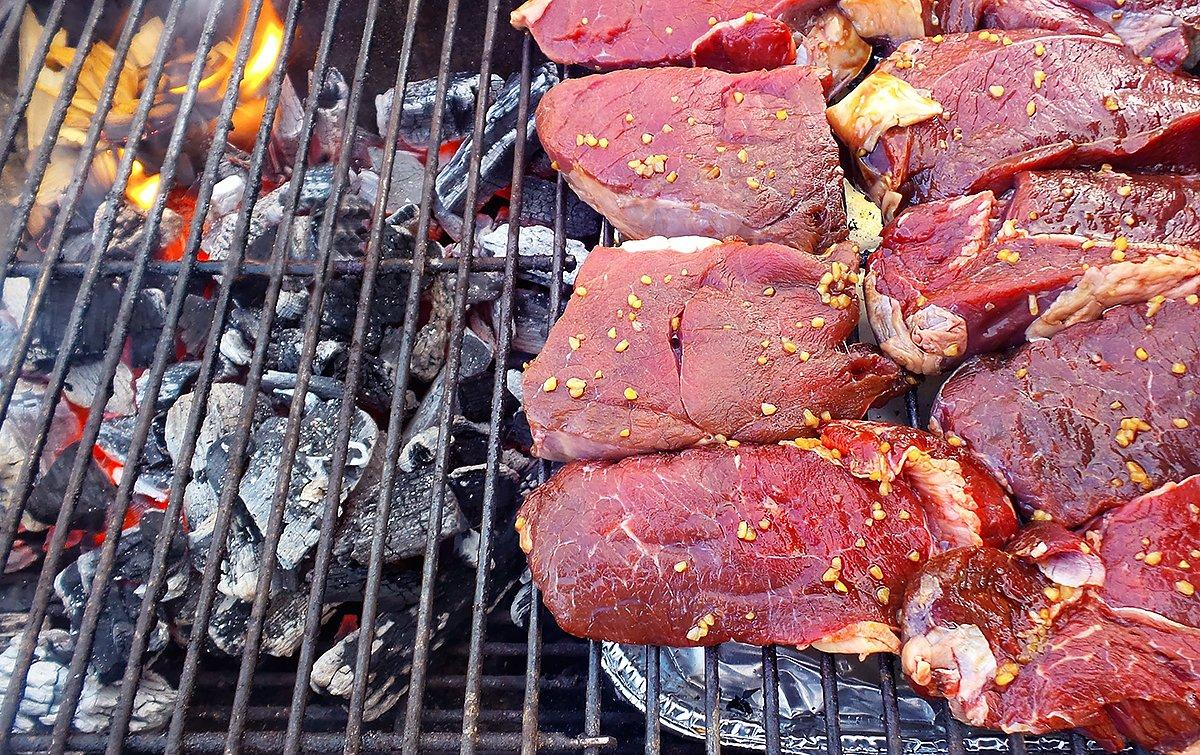 Start the steaks on the cool zone of the grill to smoke for thirty minutes before searing.