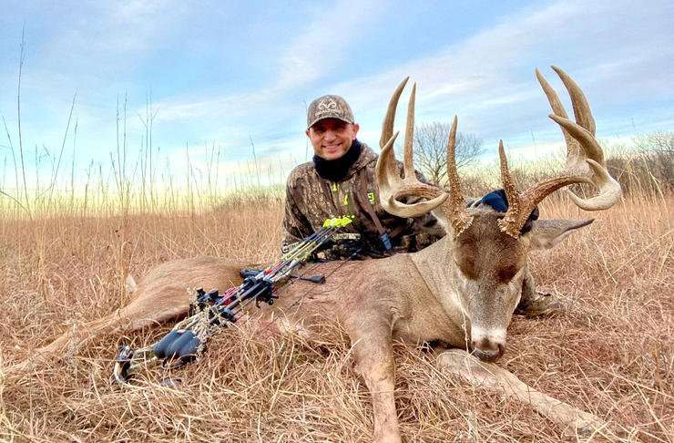 Eric Hale happily displays the deer he chased for multiple seasons. Image by Eric Hale