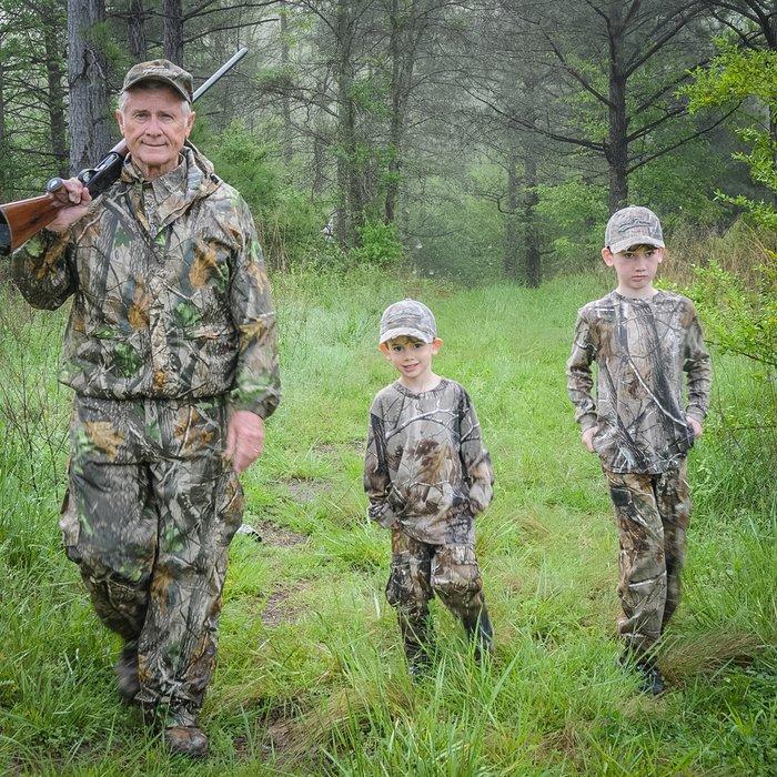 James Davis and his grandson, Ransom and Ethan, head home after a day of hunting.