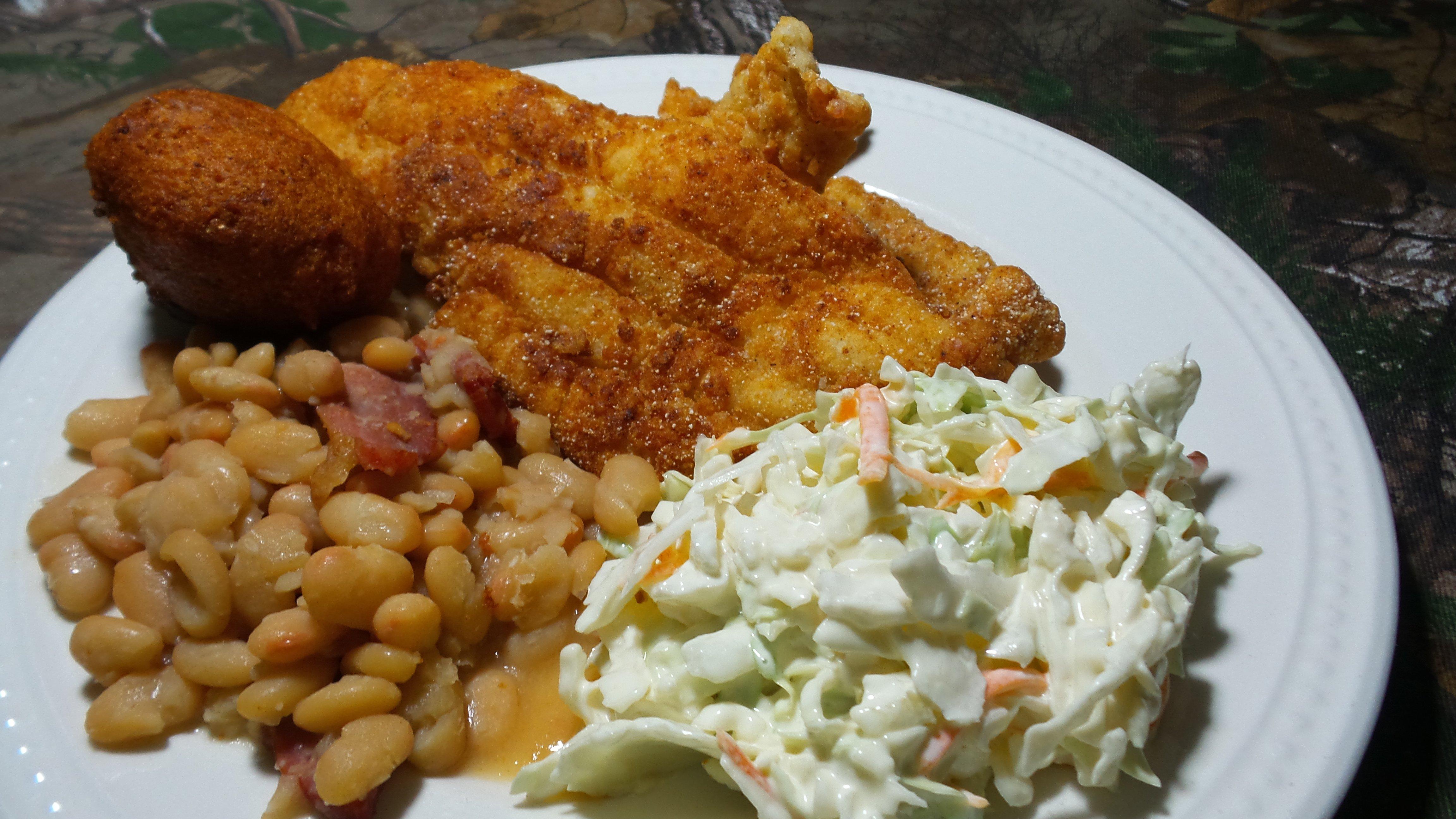 Nothing says spring like the first mess of fried fish served with coleslaw, white beans and hushpuppies.
