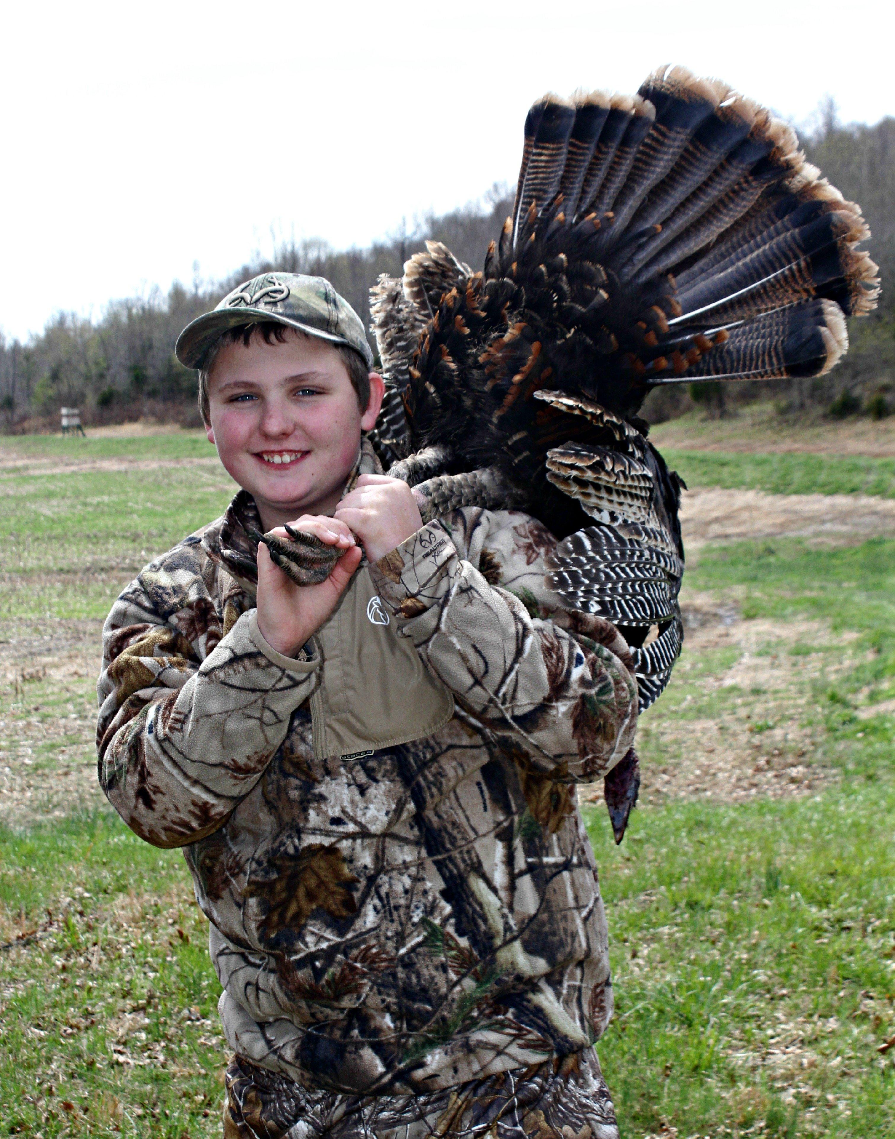 Hunter with his first solo hunt turkey.