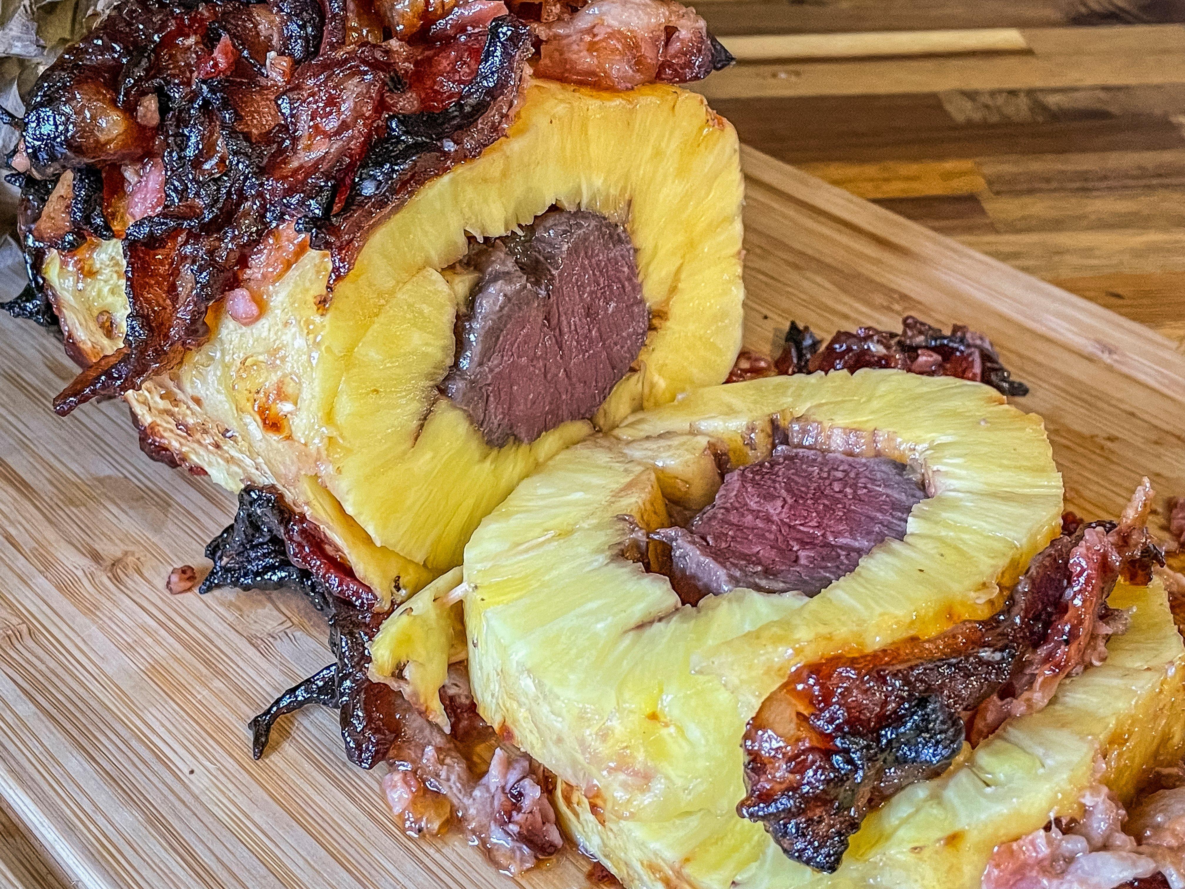 Slice through the pineapple and backstrap for serving.
