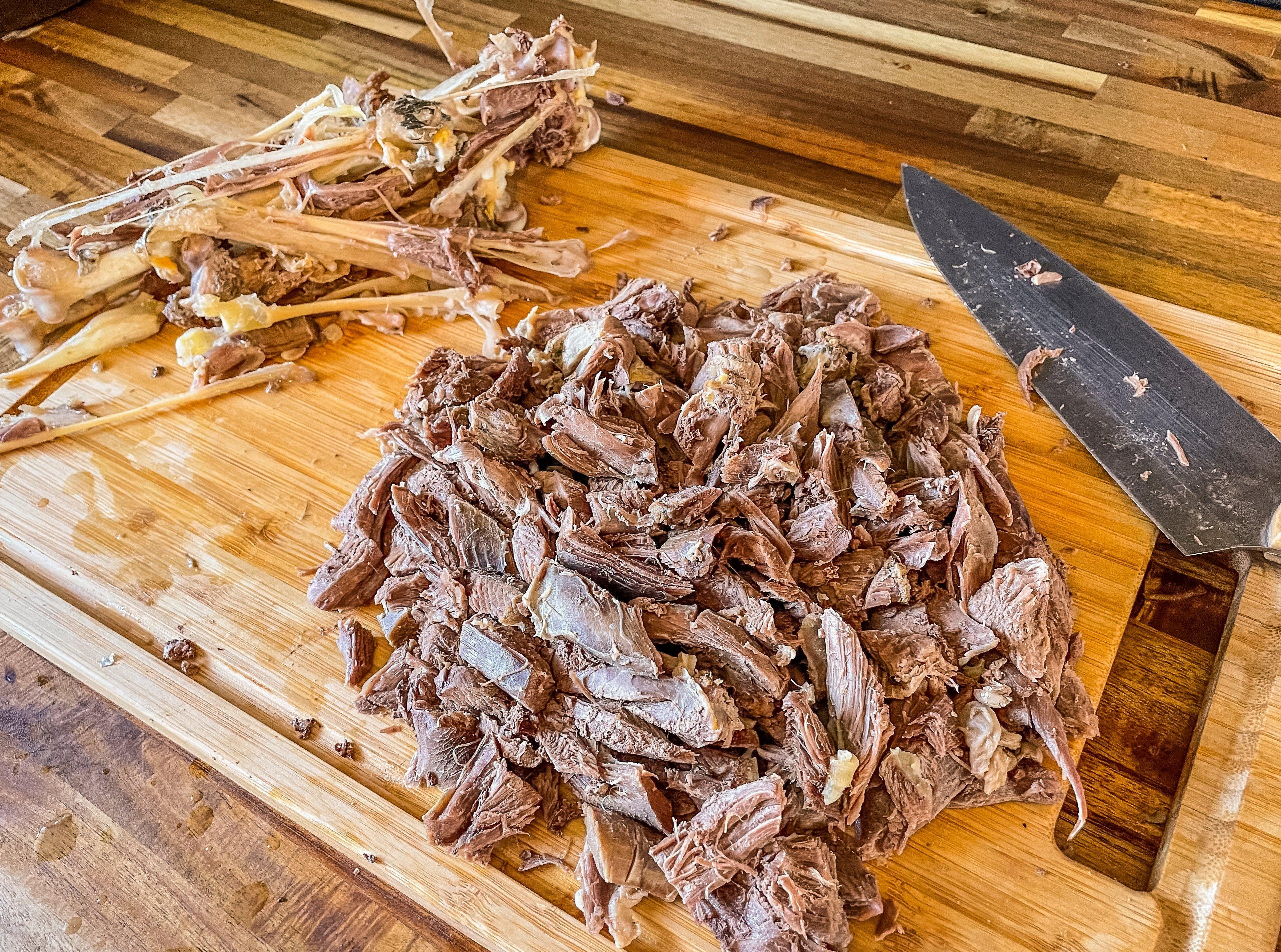 Slow simmer the legs until you can pick the meat from the bone.