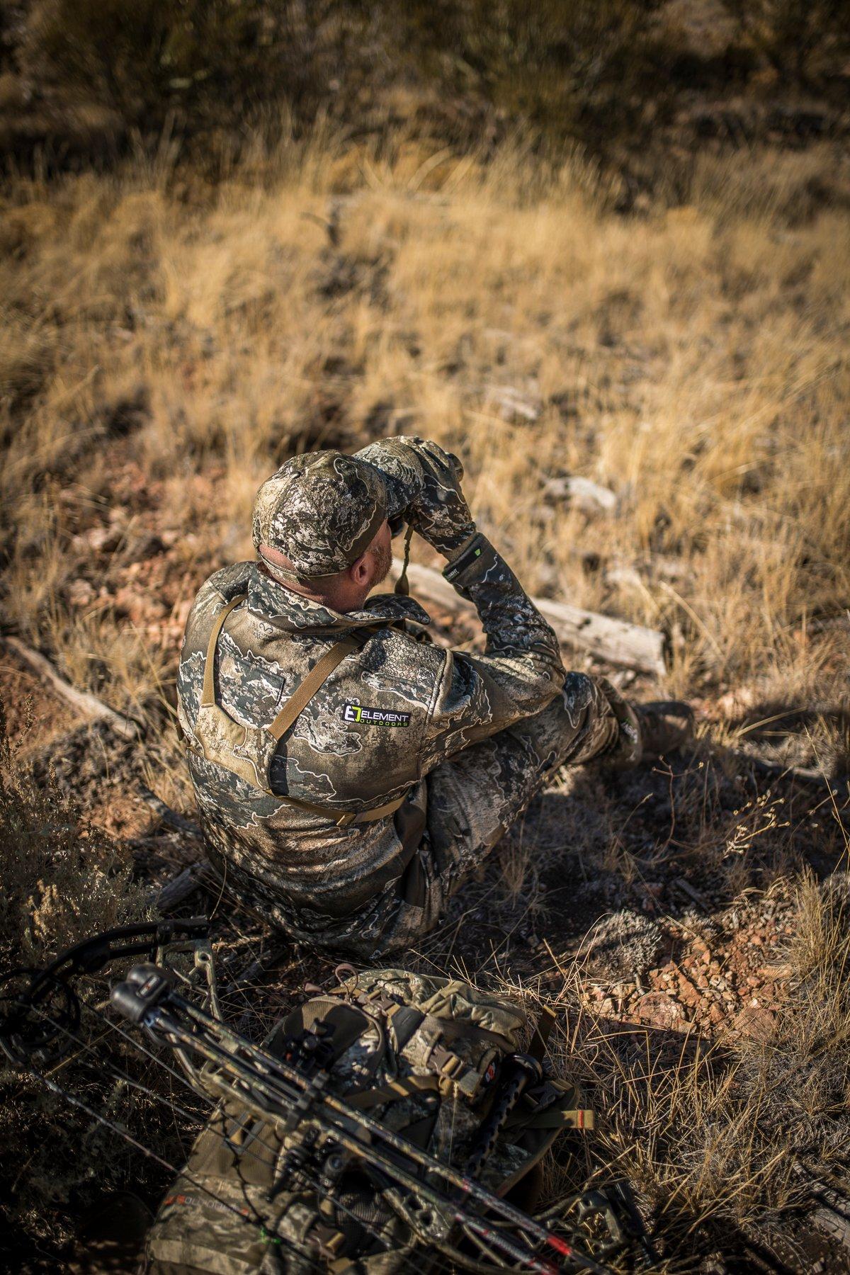 Good glass is a must on any elk hunt. Image by Bill Konway