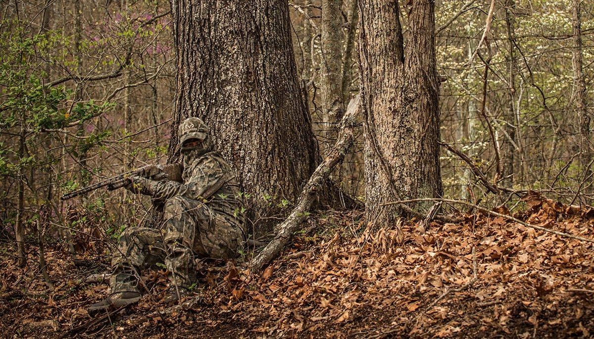 Don't get surprised by a gobbler in the timber. Plan your setup for multiple shot opportunities. Image by Bill Konway