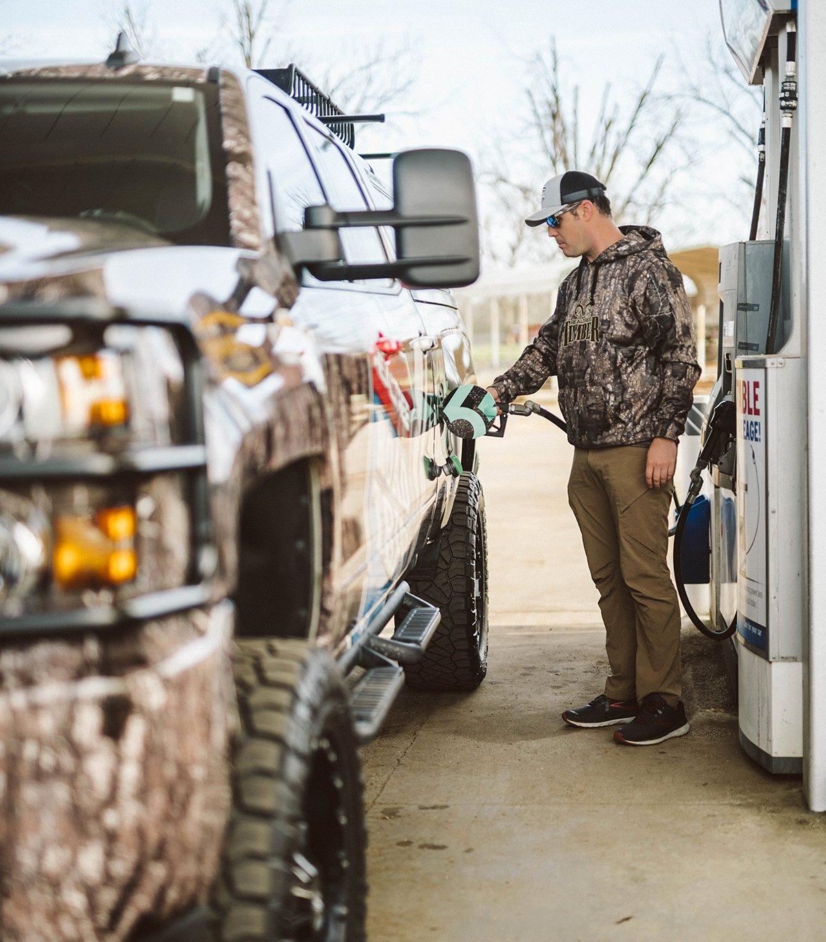 Realtree's Tyler Jordan gasses up during a recent road trip. Image by Hunter Phelps/Realtree Road Trips