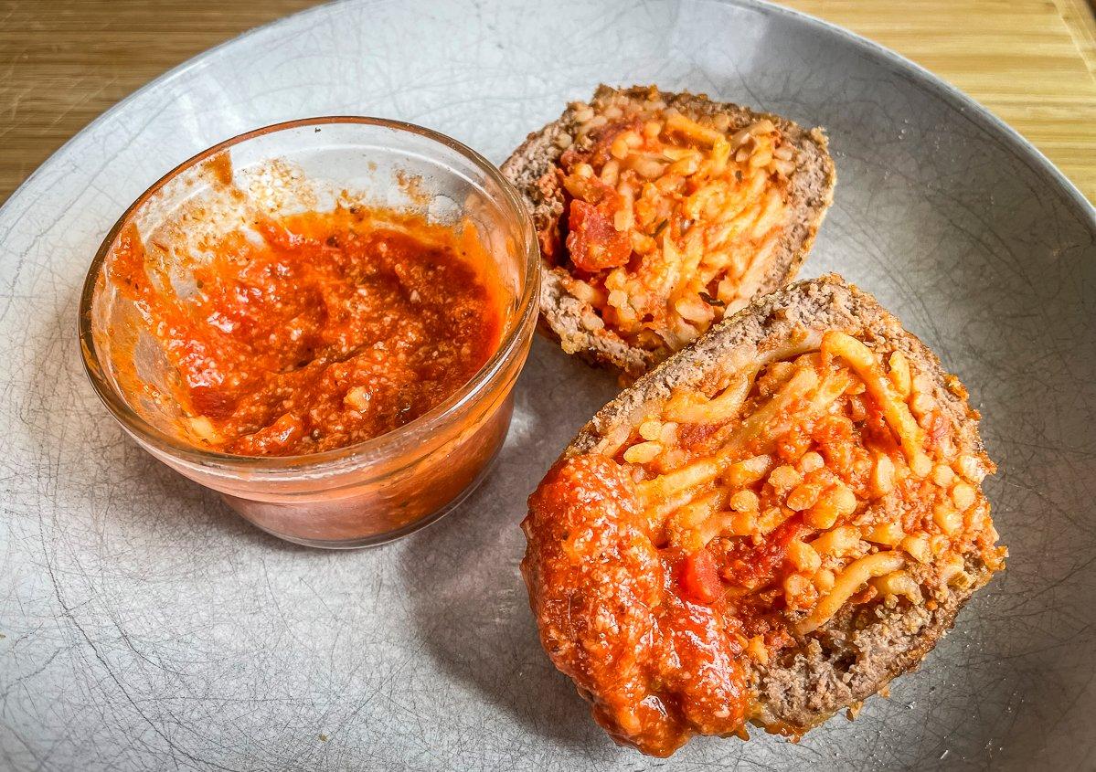 Serve the meatballs with marinara blended with parmesan cheese for dipping.