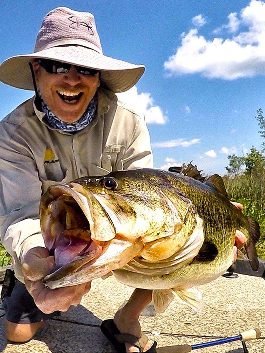 The author shows off a monster bass. Image by Joe Balog