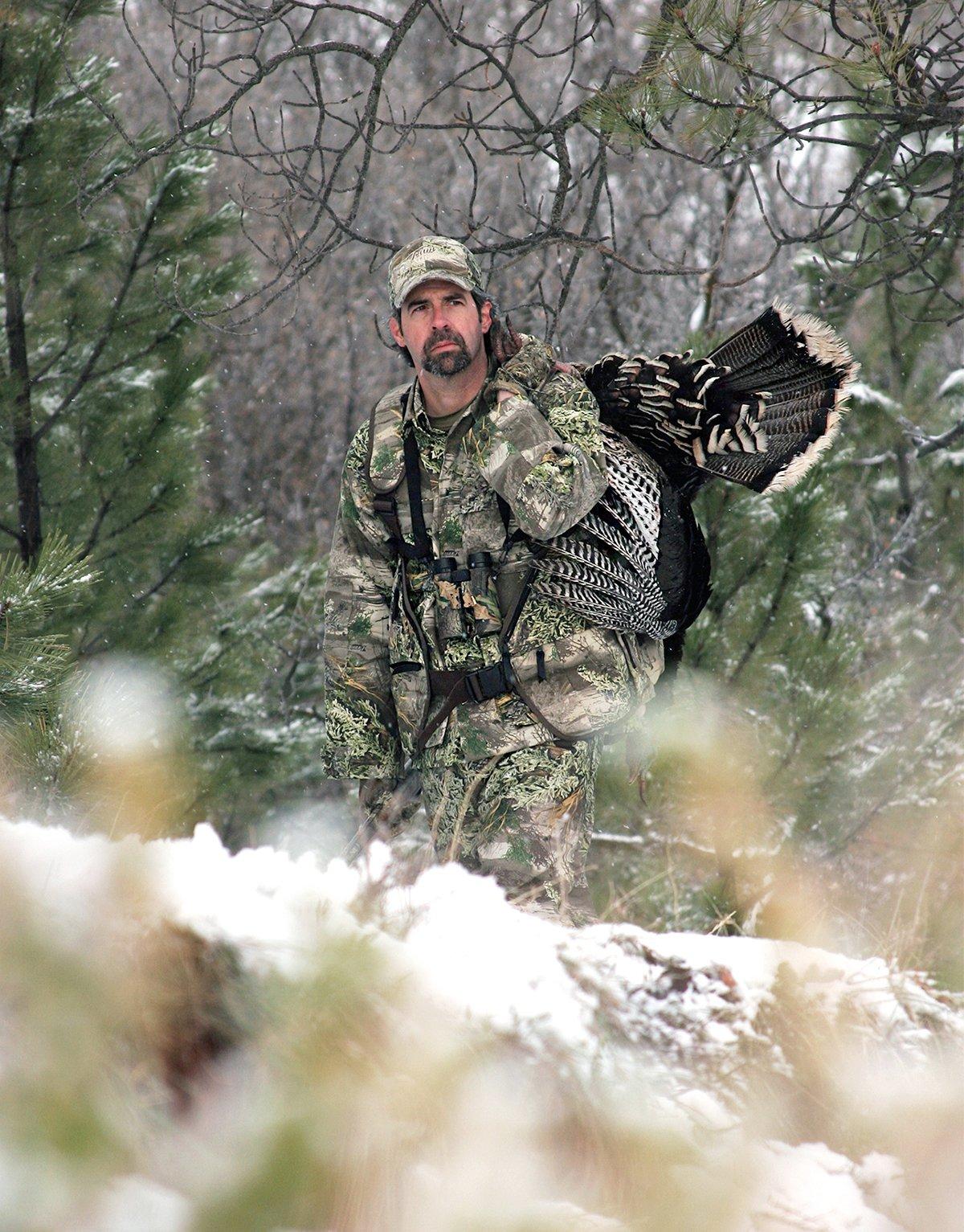 That's me thinking about lunch back at camp, with a Wyoming Merriam's on my shoulder. Image by John Hafner