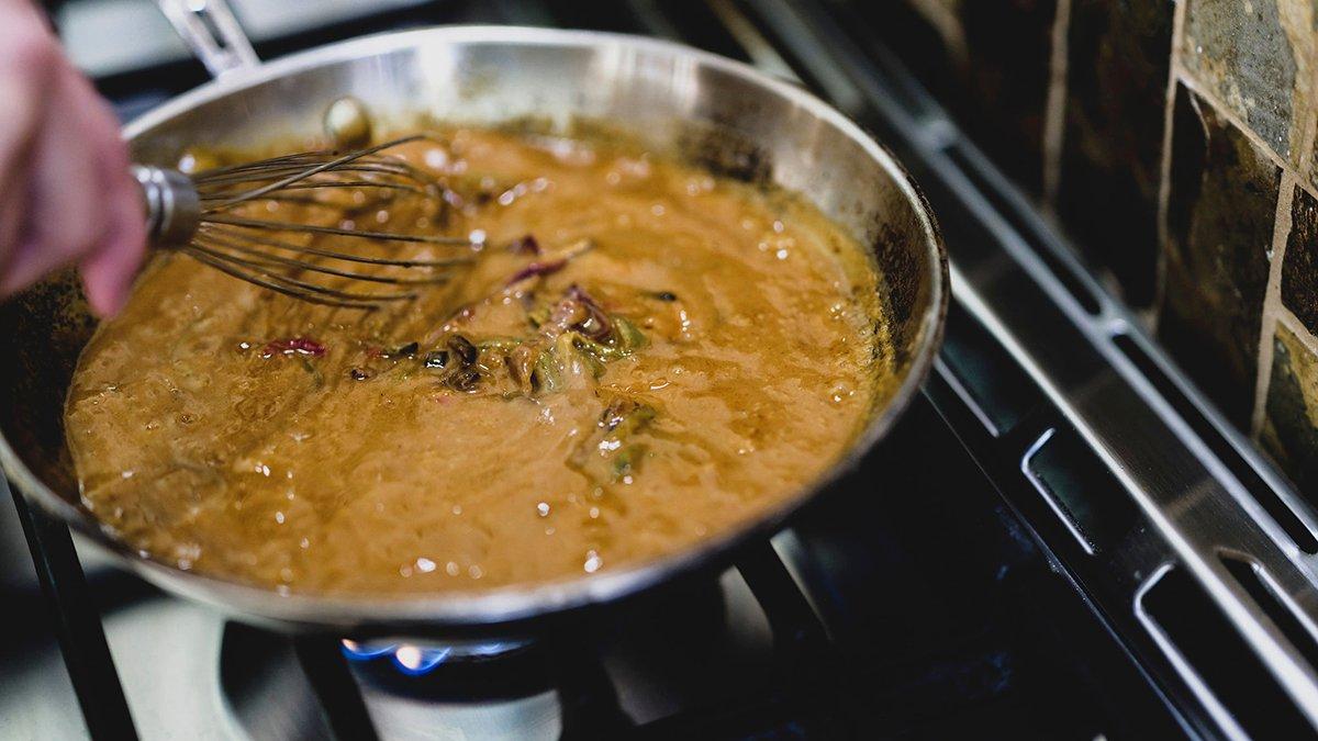 Simmer the etouffee until the sauce thickens. Image by Grit Media