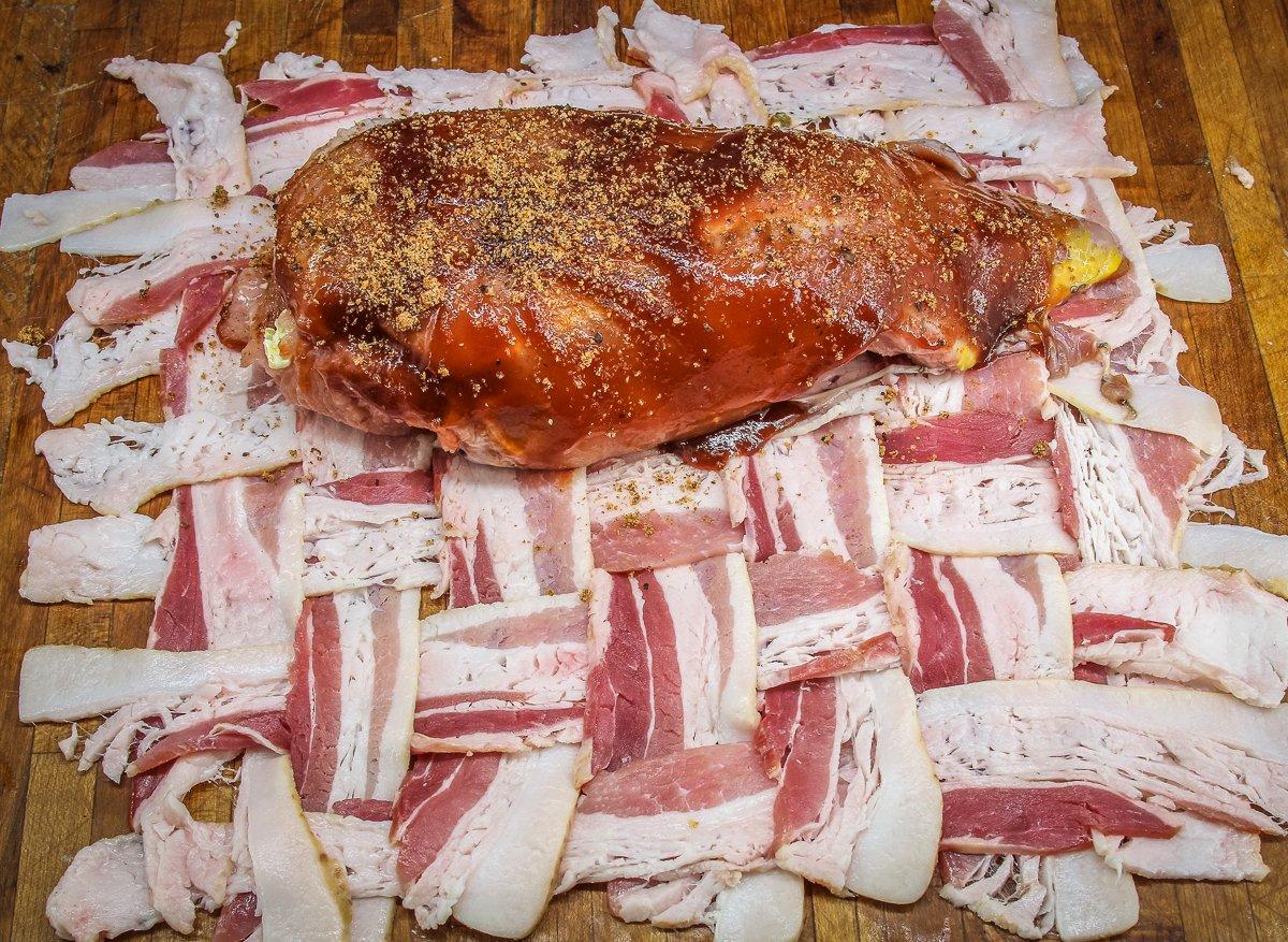 Wrap the turkey breast with a bacon weave.