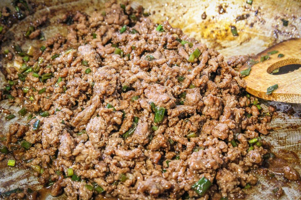 Brown the filling mixture in a skillet, then allow to cool before filling the buns.