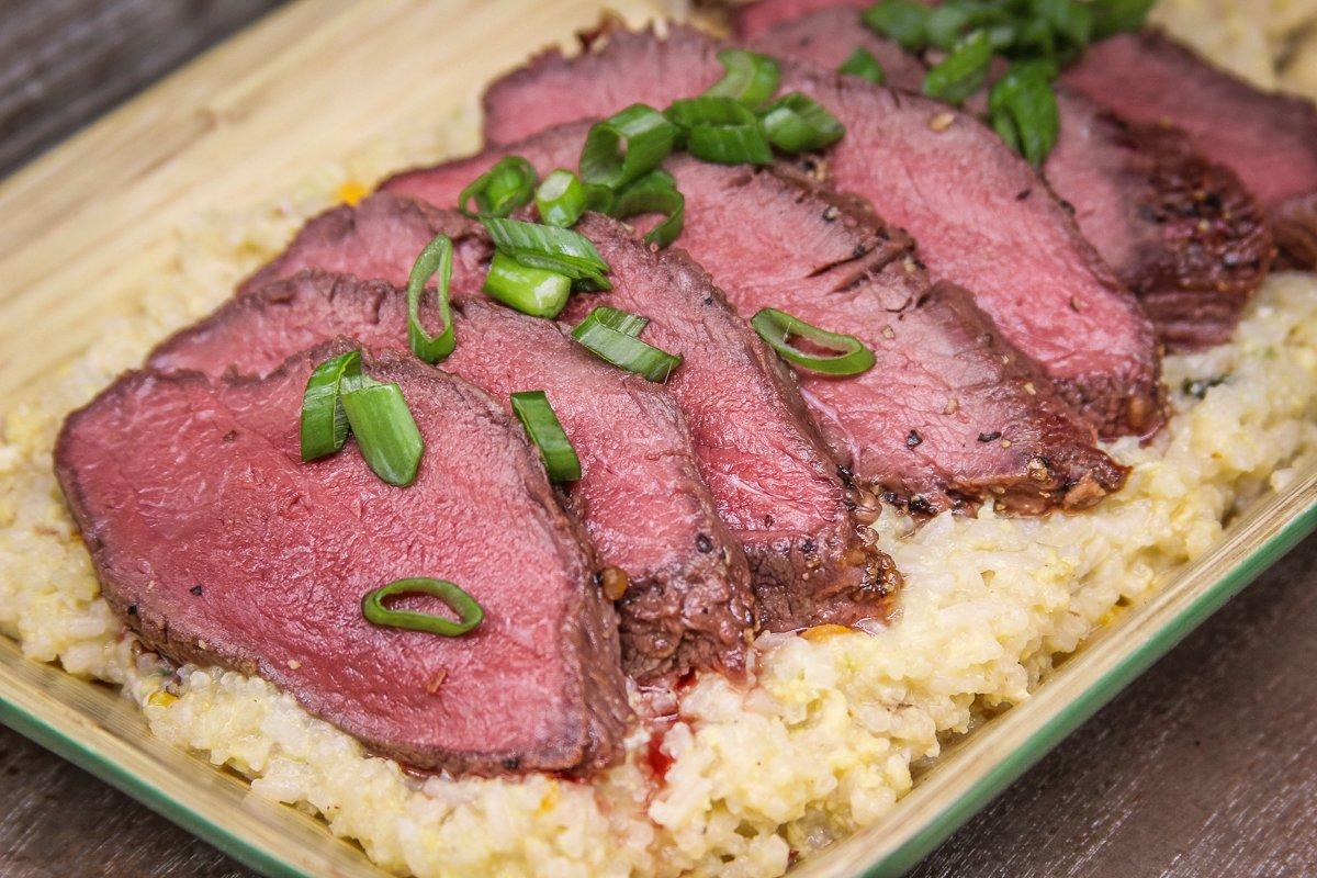 Slice the backstrap and serve with rice or vegetables.