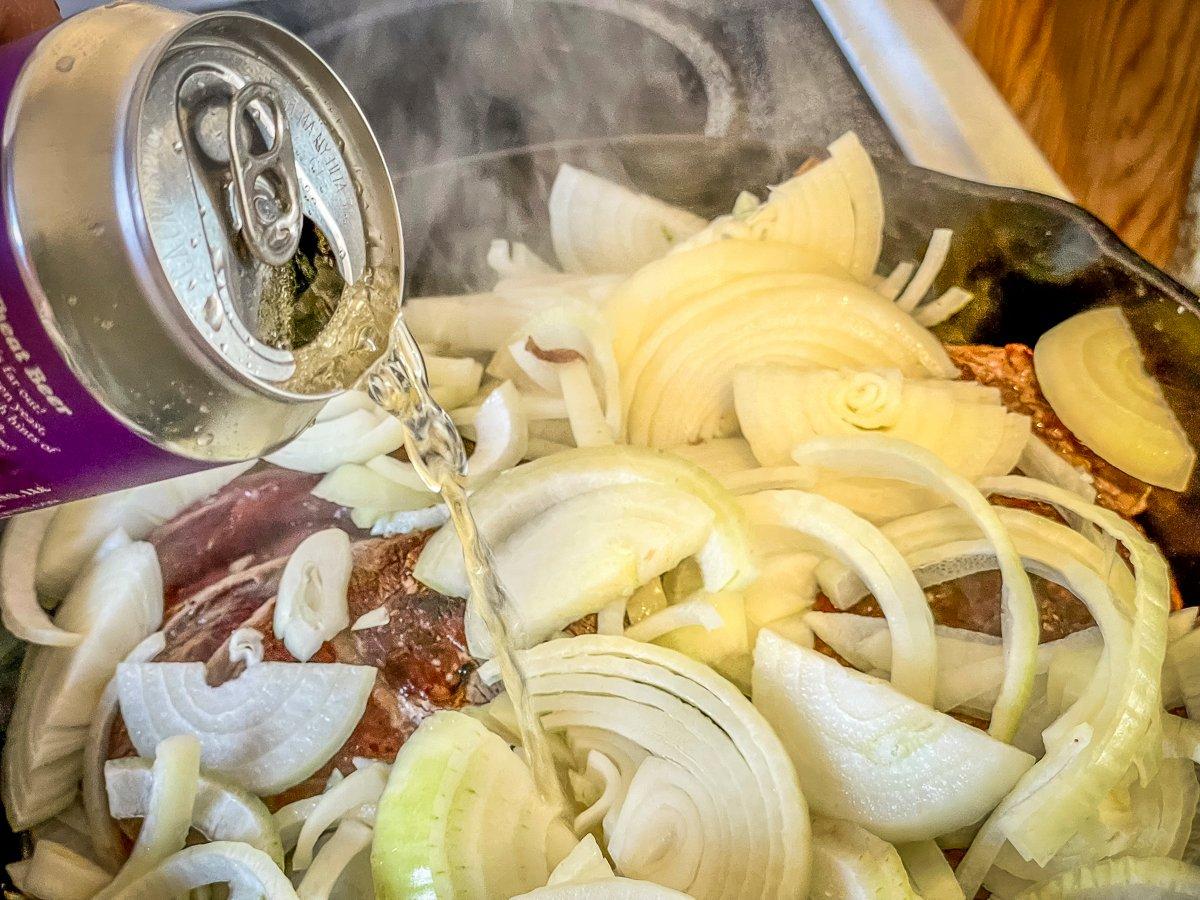 Add the onions and beer or stock to the pan before covering and reducing heat.