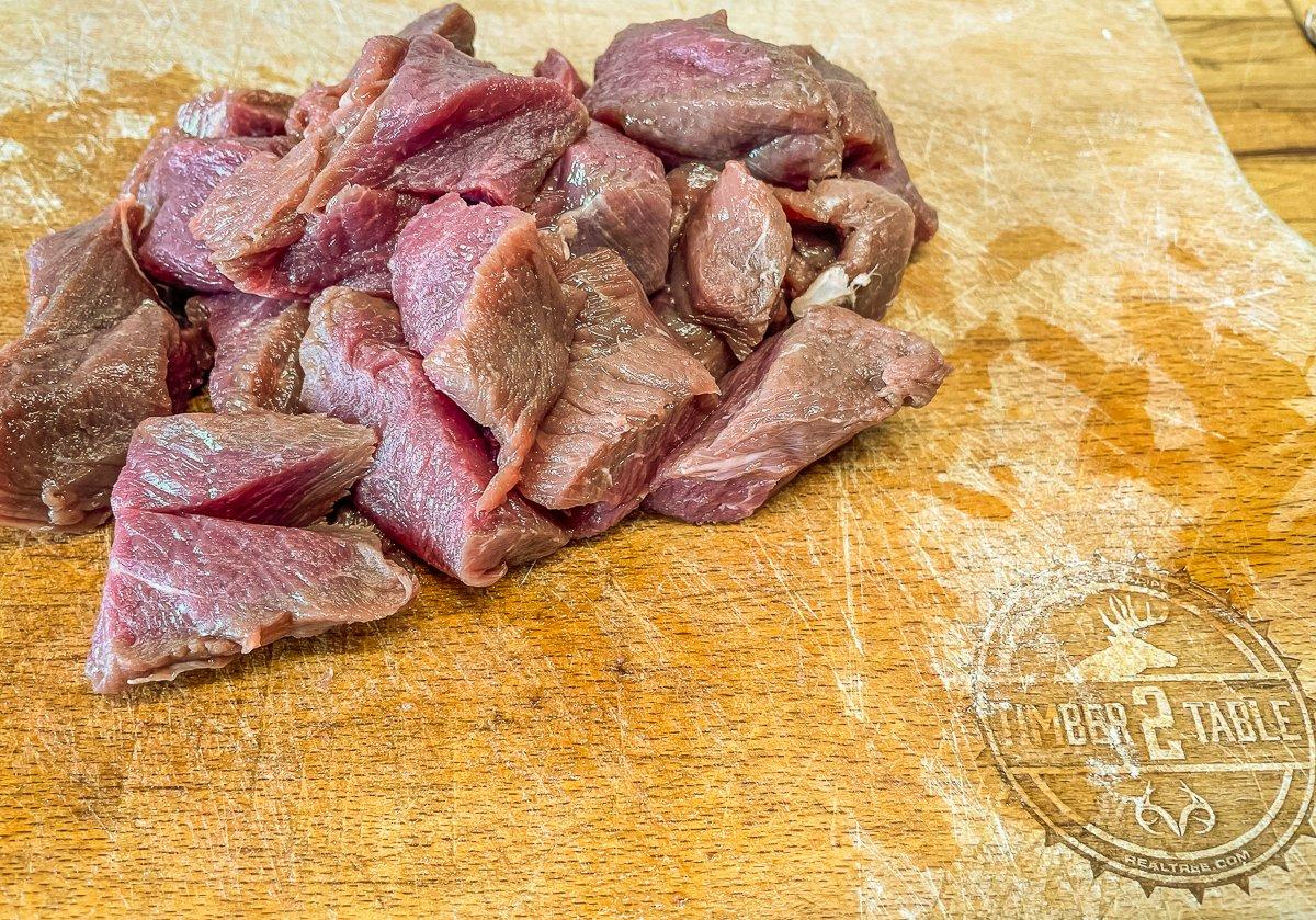 Slice backstrap into 1-inch bites.