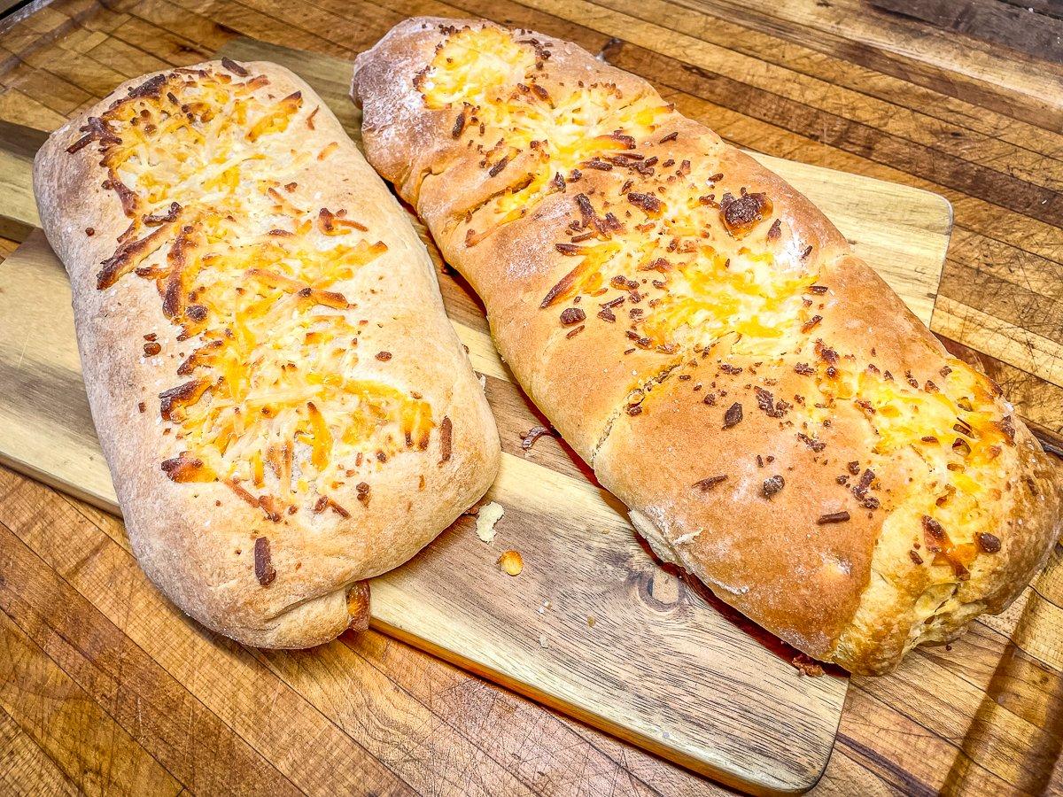 Top the dough with additional cheese, then bake to a golden brown.