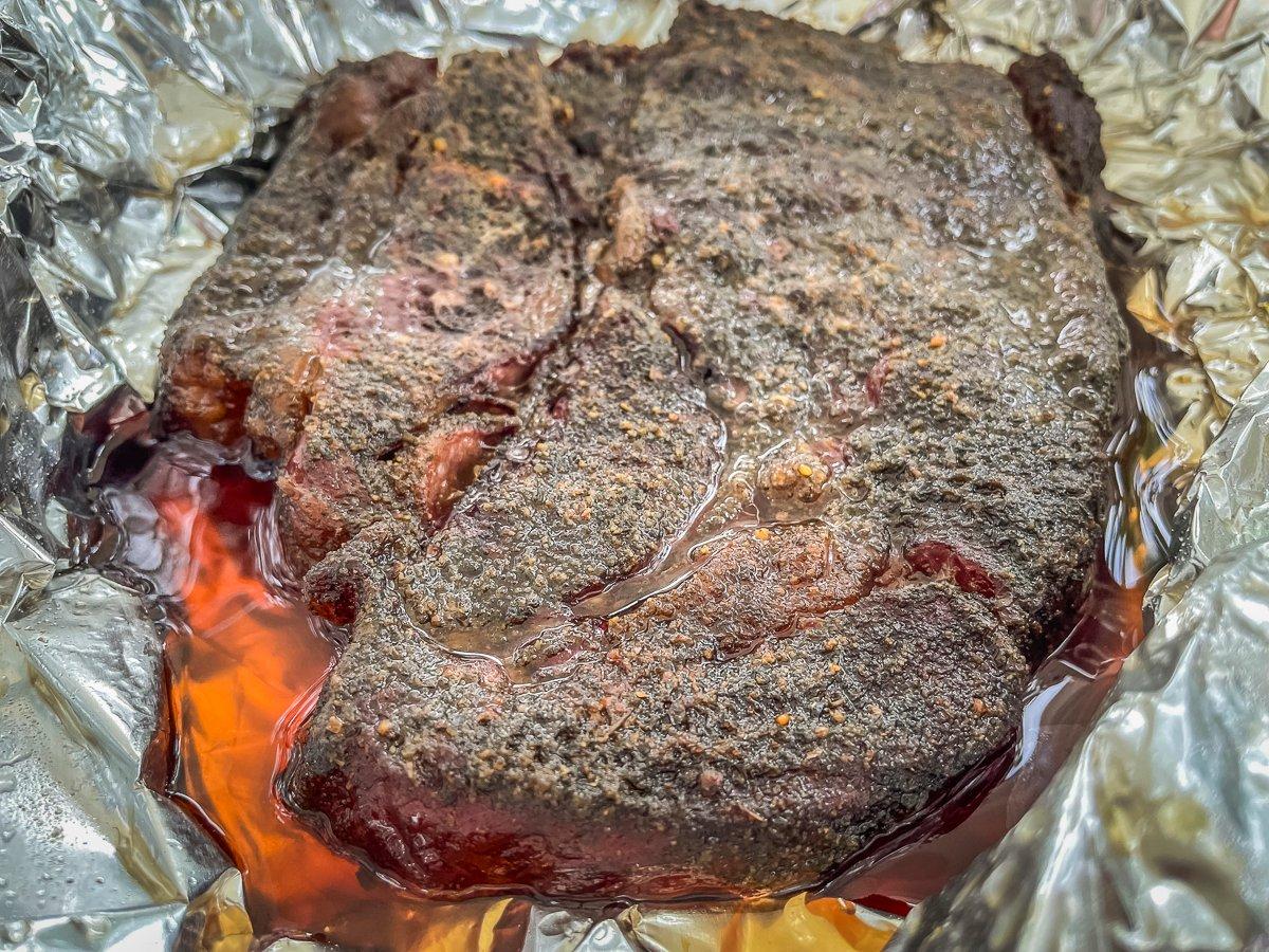 Smoke the roast open on the smoker to 165 degrees, then wrap in foil and bring to 200 degrees for tenderness.