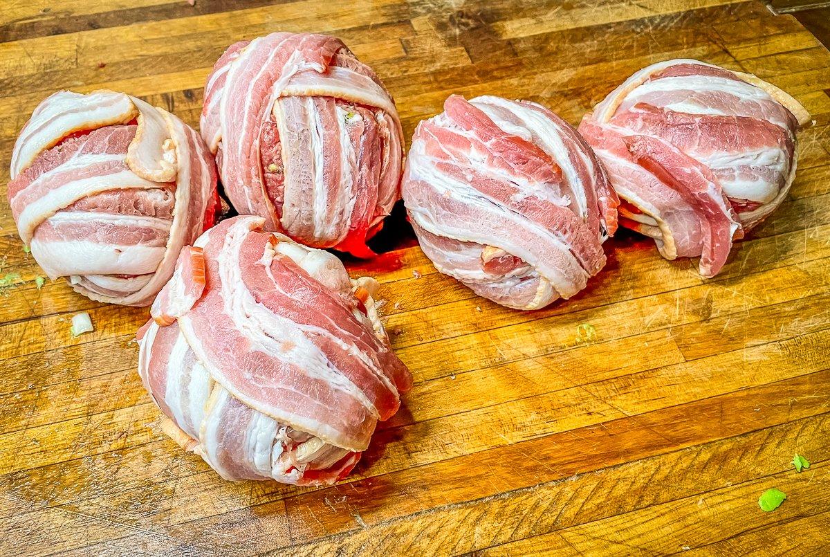 Wrap tightly with bacon.