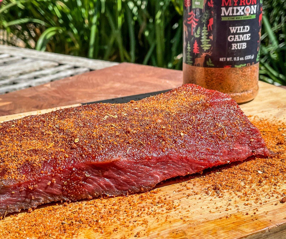 Season the backstrap with your favorite wild game or bbq rub.