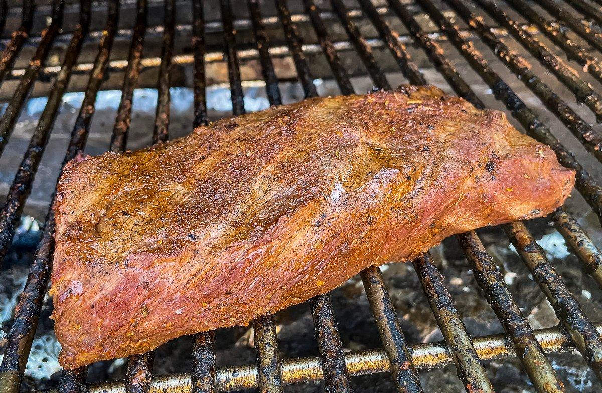 Grill the backstrap to desired doneness.