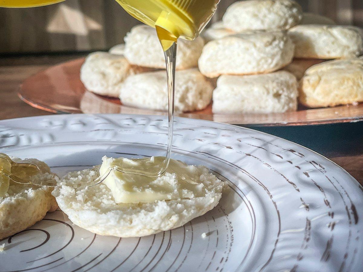 Top the warm biscuits with a drizzle of honey.