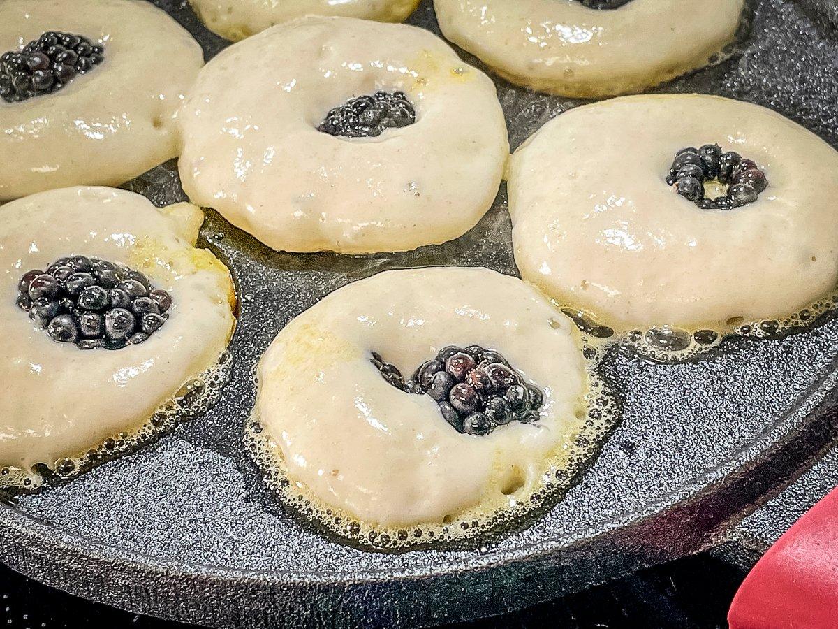 Stuff a blackberry or two or three into the center of each aebleskiver before the batter sets.